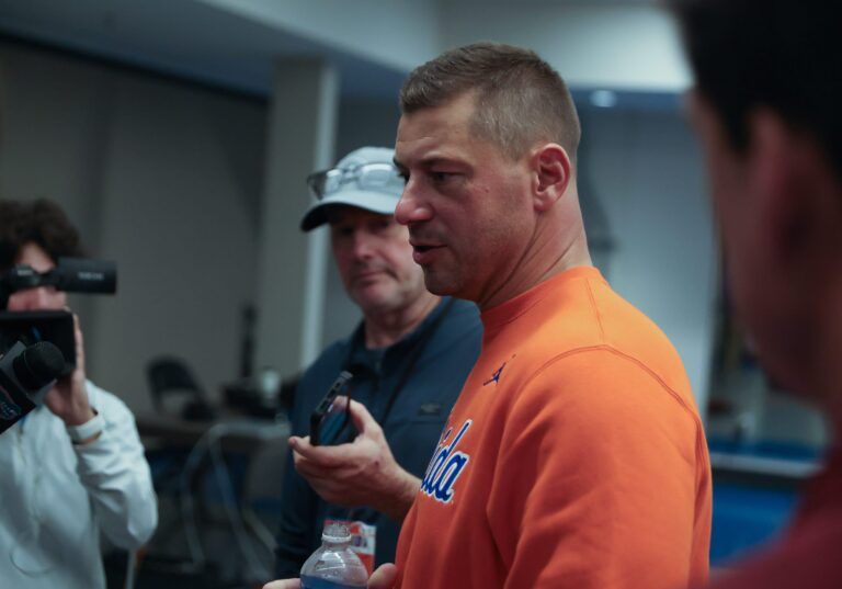 New Gator head football coach Jon Sumrall fires up the crowd during the first half an NCAA basketball game at Steven C. O'Connell Center Exactek arena in Gainesville, FL on Saturday, January 24, 2026. Auburn won 76-67 [Alan Youngblood/Gainesville Sun]