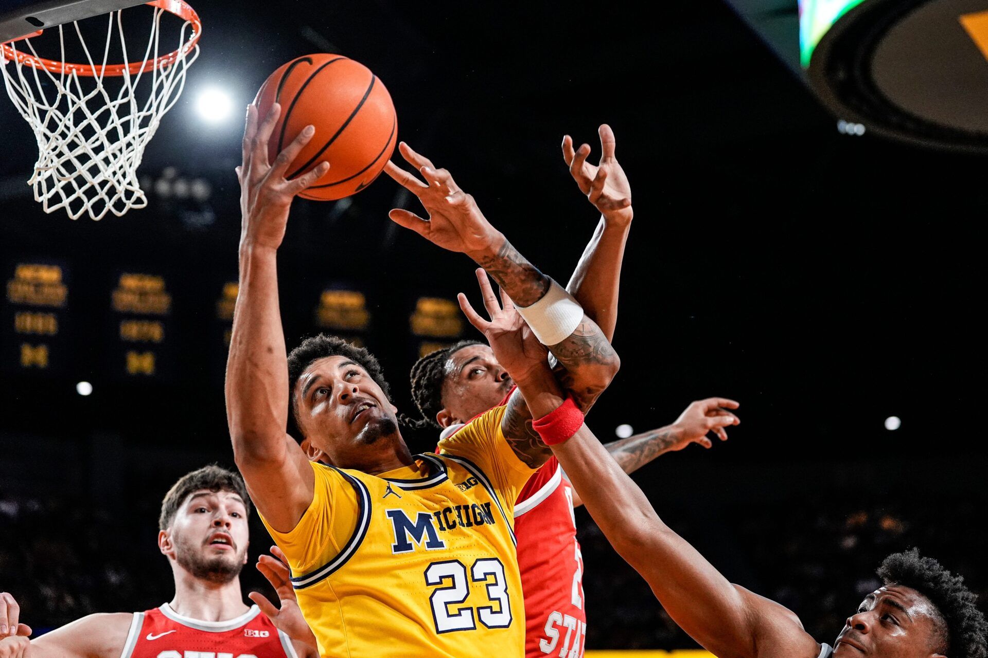Michigan forward Yaxel Lendeborg (23) grabs a rebound against Ohio State during the first half at Crisler Center in Ann Arbor on Friday, Jan. 23, 2026.
