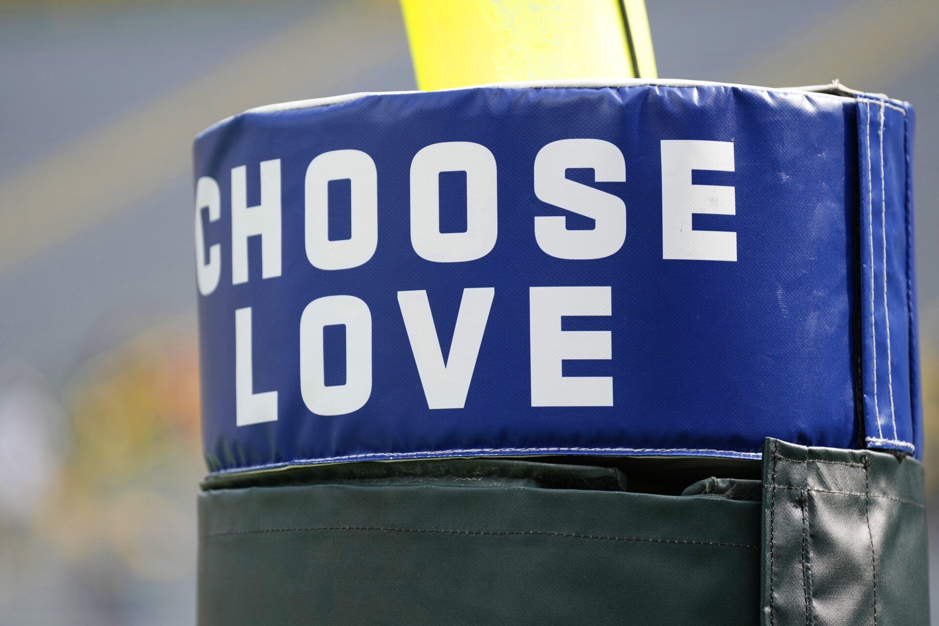 Choose Love phrase on goalpost padding during warmups prior to the game between the New Orleans Saints and Green Bay Packers at Lambeau Field.