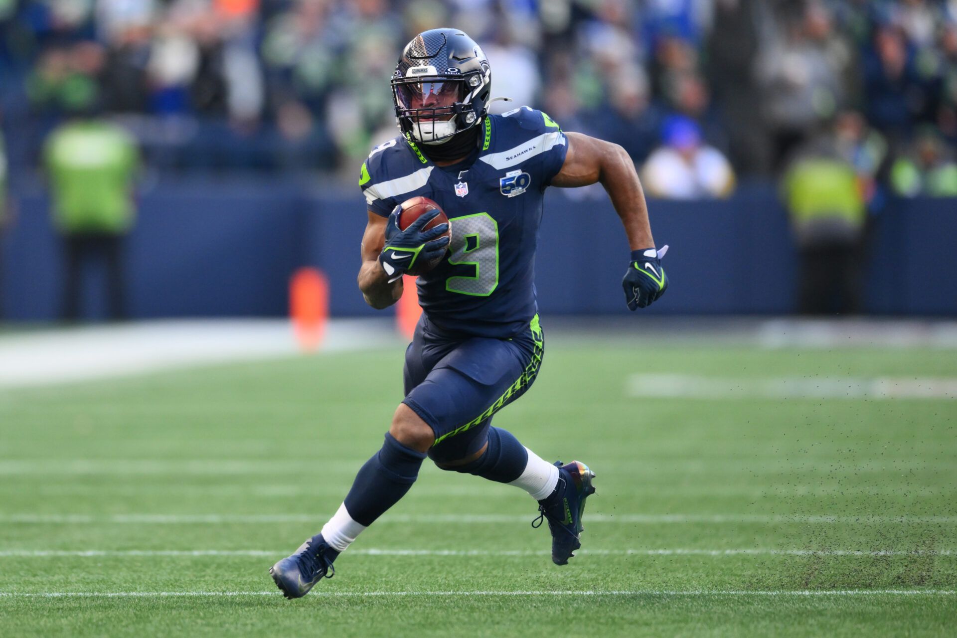 Seattle Seahawks running back Kenneth Walker III (9) runs against the Los Angeles Rams in the first half in the 2026 NFC Championship Game at Lumen Field.