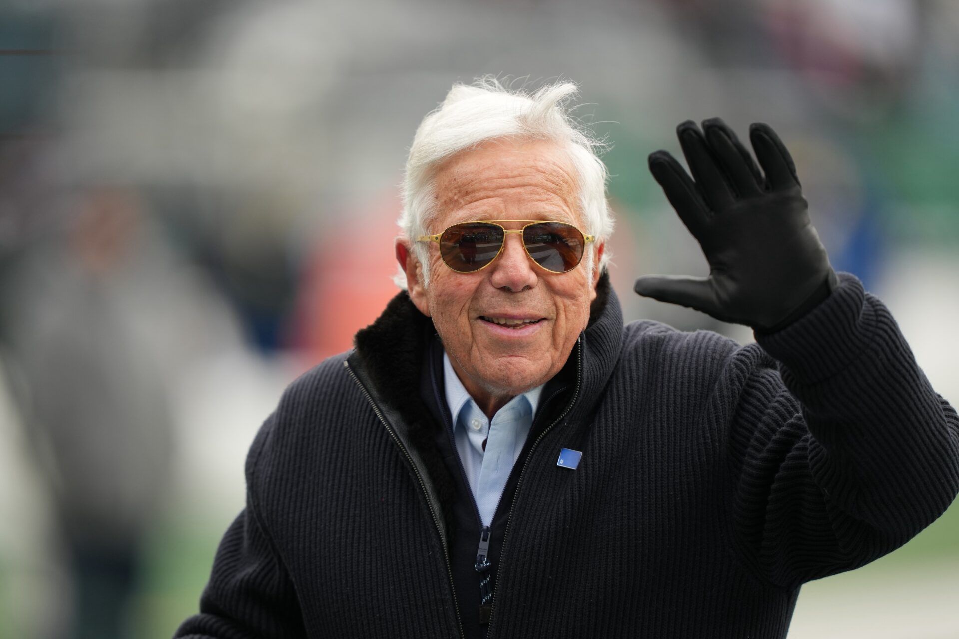 New England Patriots owner Robert Kraft waves prior to the game against the New York Jets at MetLife Stadium.