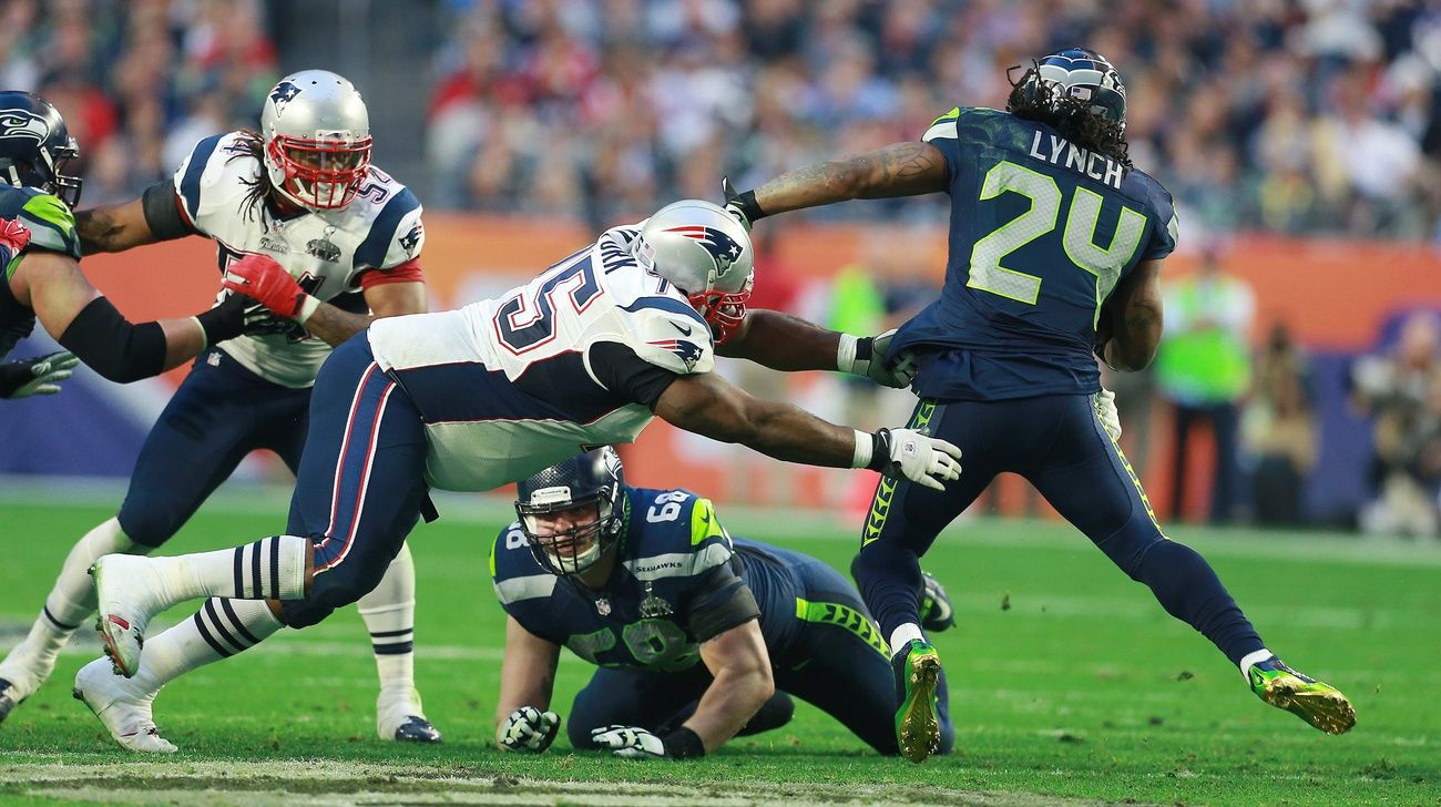 GLENDALE, AZ -- Sunday, February 1, 2015 SUPER Bowl XLIX -- Seattle Seahawks vs. New England Patriots:   Seahawk Marshawn Lynch slips away from a diving Vince WIlfork in the second quarter.

Wilfork Superbowl 43