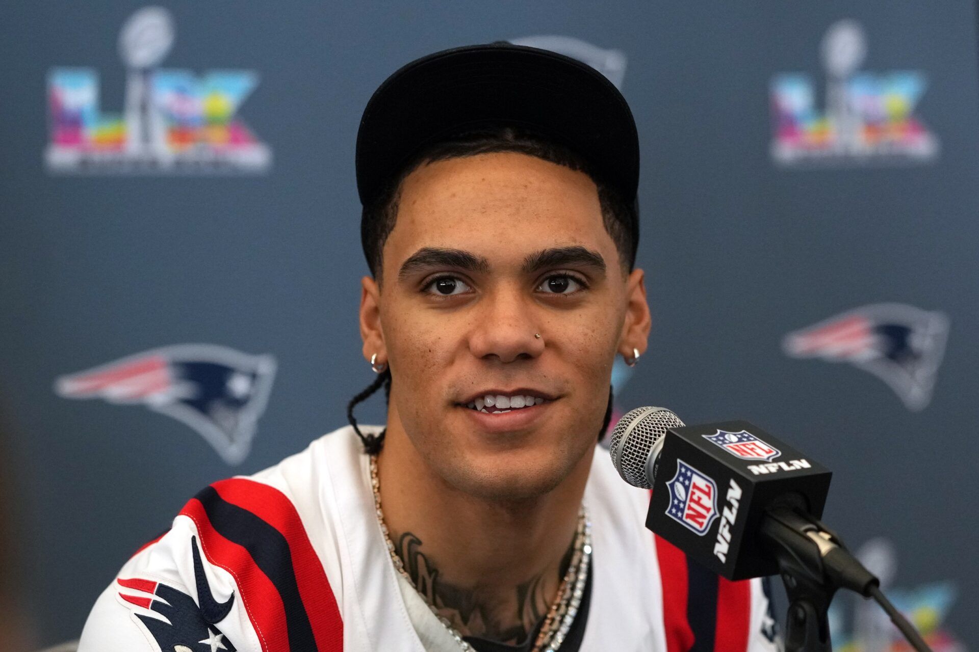 New England Patriots cornerback Christian Gonzalez (0) talks to media members at the Santa Clara Marriott.