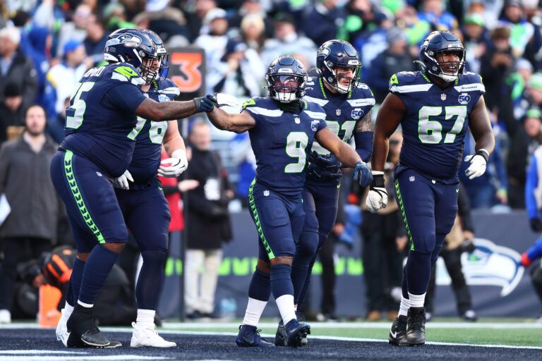 Seattle Seahawks running back Kenneth Walker III (9) celebrates after running for a touchdown in the first half against the Los Angeles Rams in the 2026 NFC Championship Game at Lumen Field.