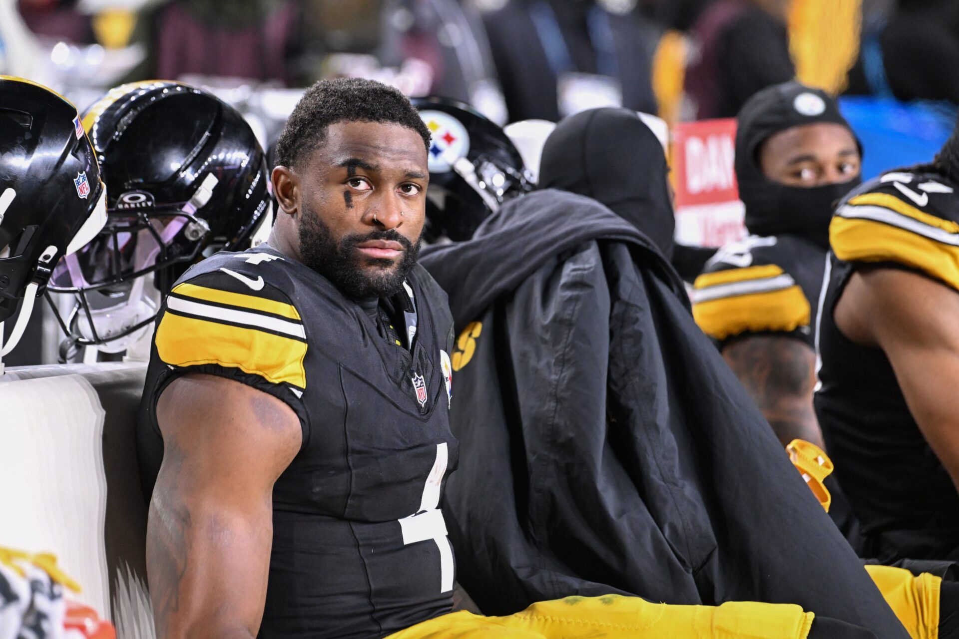 Pittsburgh Steelers wide receiver Dk Metcalf (4) sits on the bench in the fourth quarter of an AFC Wild Card Round loss to the Houston Texans at Acrisure Stadium.