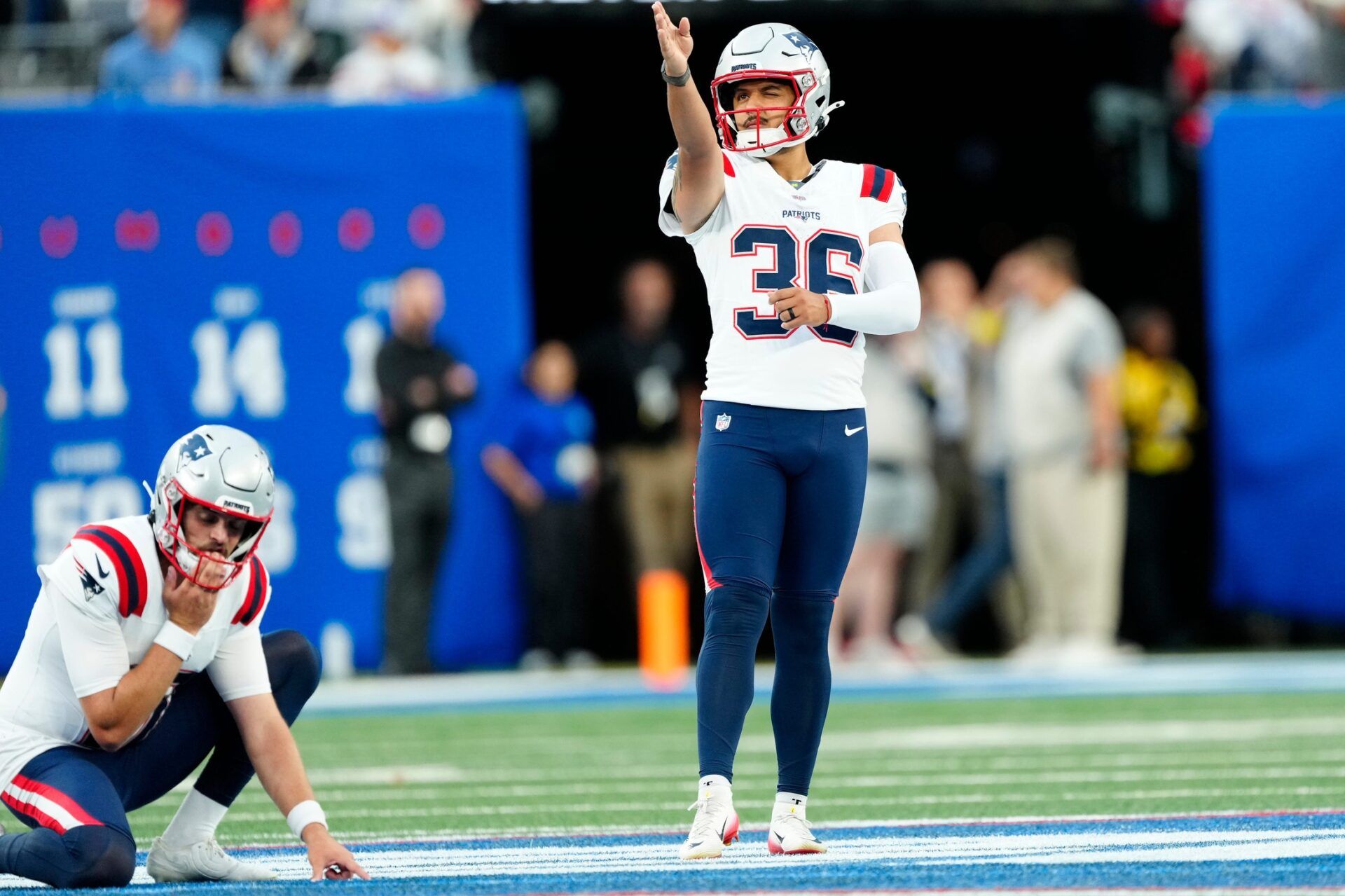 New England Patriots place kicker Andy Borregales (36) tries to line up a practice kick, Thursday, August 21, 2025, in East Rutherford.