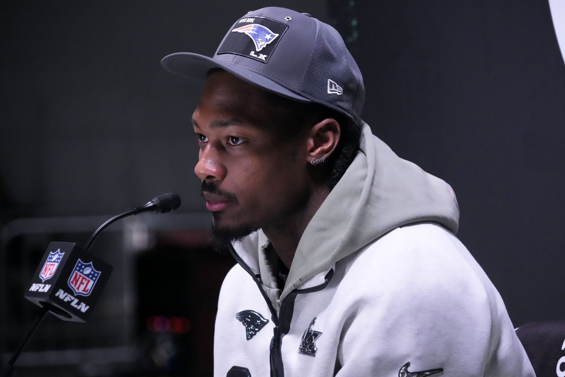 New England Patriots wide receiver Stefon Diggs (8) speaks to the media during Opening Night for Super Bowl LX at San Jose Convention Center.