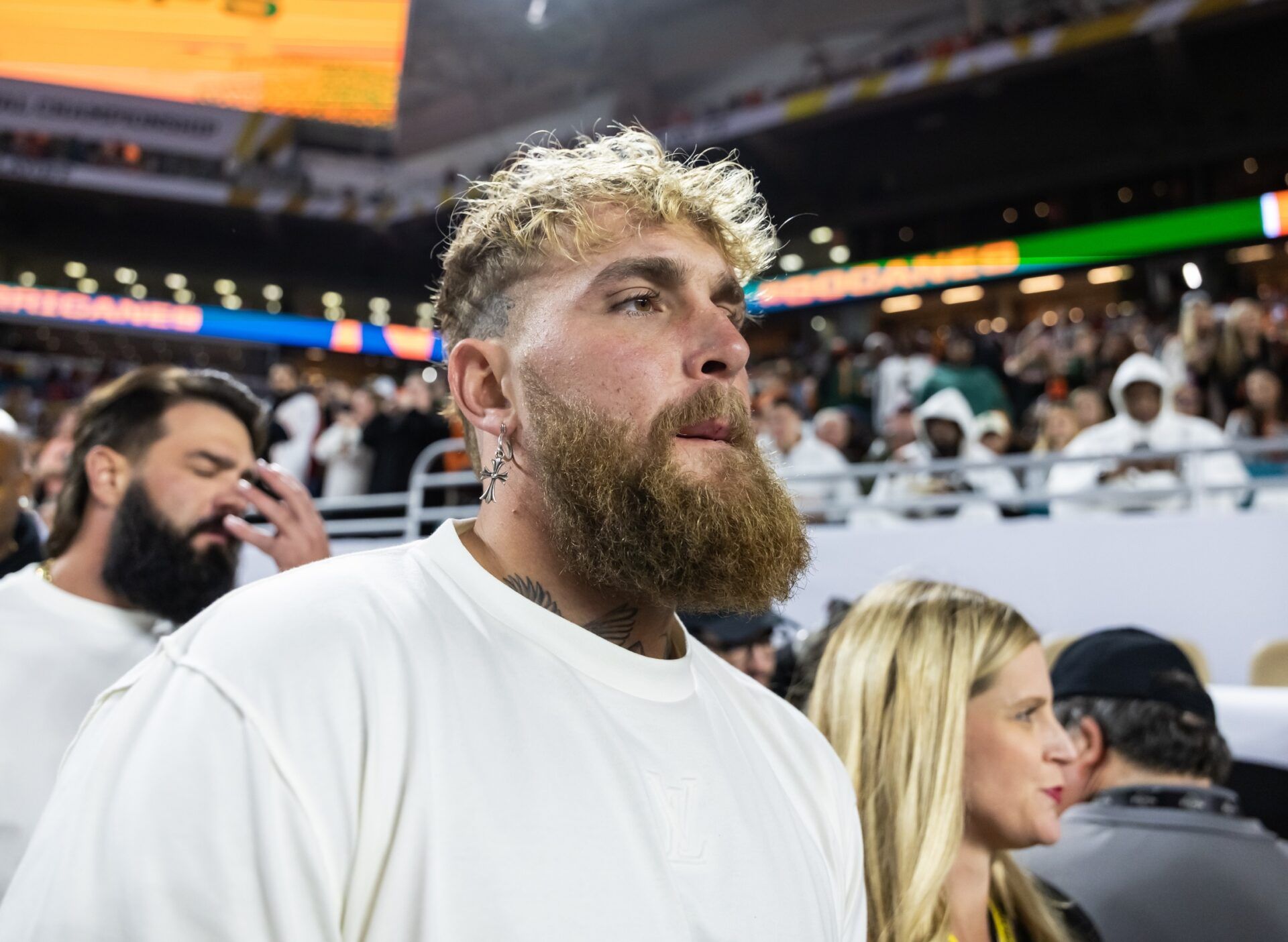 Jake Paul on the sidelines during the College Football Playoff National Championship game at Hard Rock Stadium.