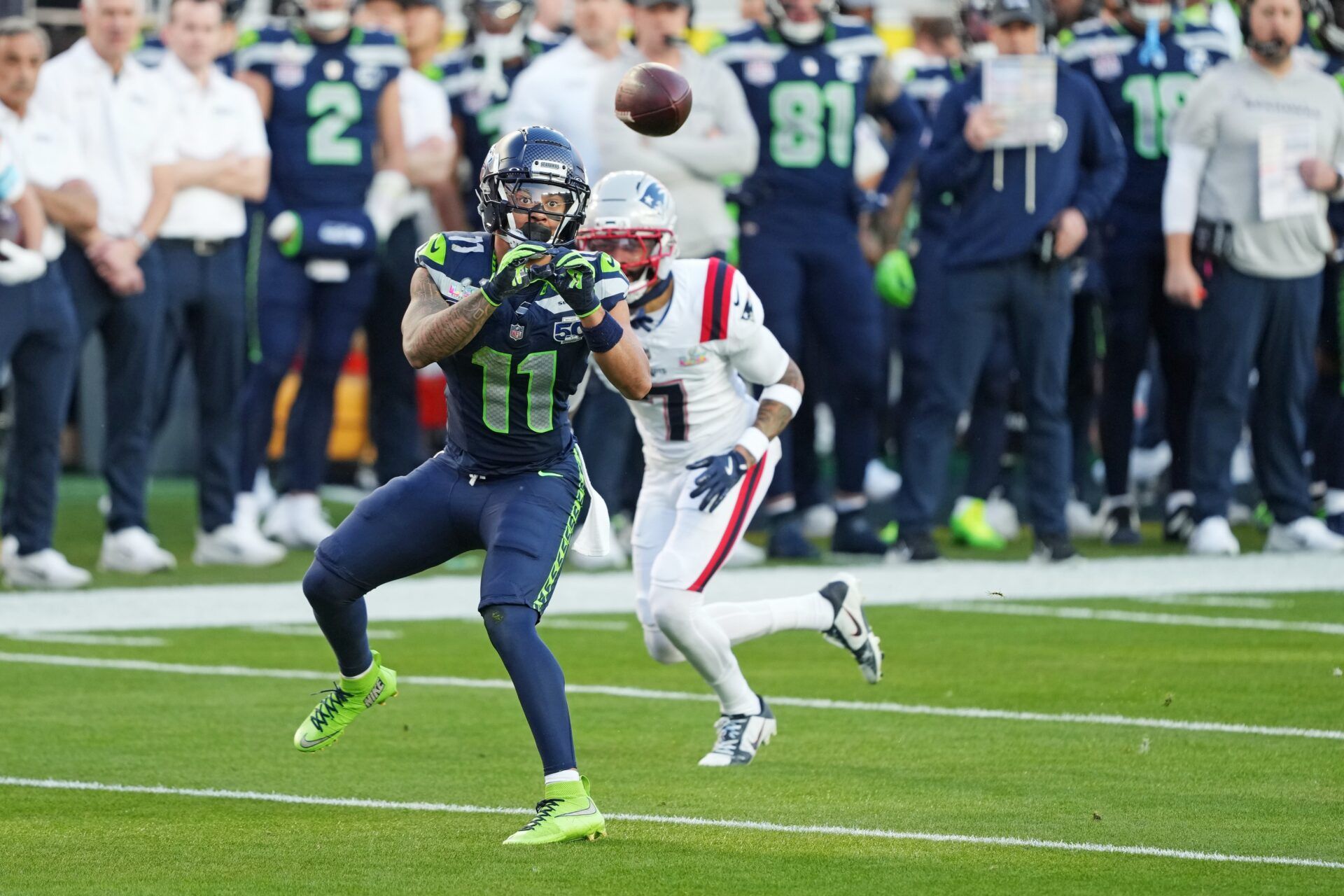 Seattle Seahawks wide receiver Jaxon Smith-Njigba (11) makes a c atch against New England Patriots cornerback Carlton Davis III (7) during the first quarter in Super Bowl LX at Levi's Stadium.