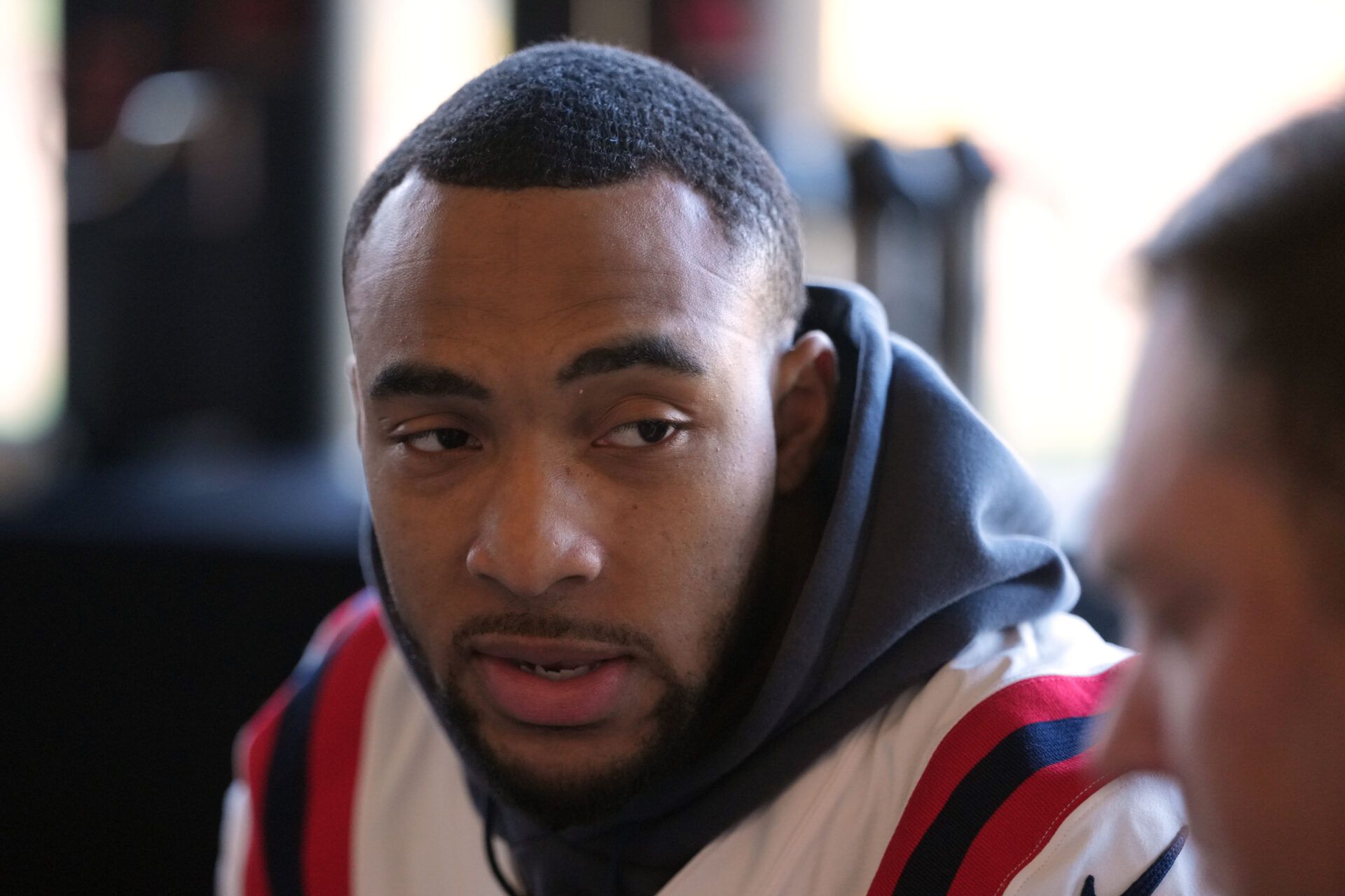 New England Patriots running back Treveyon Henderson (32) talks to media members at the Santa Clara Marriott.