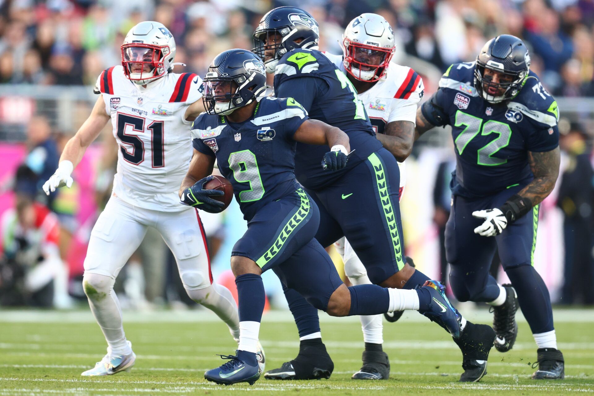 Seattle Seahawks running back Kenneth Walker III (9) runs against the New England Patriots during the second quarter in Super Bowl LX at Levi's Stadium.