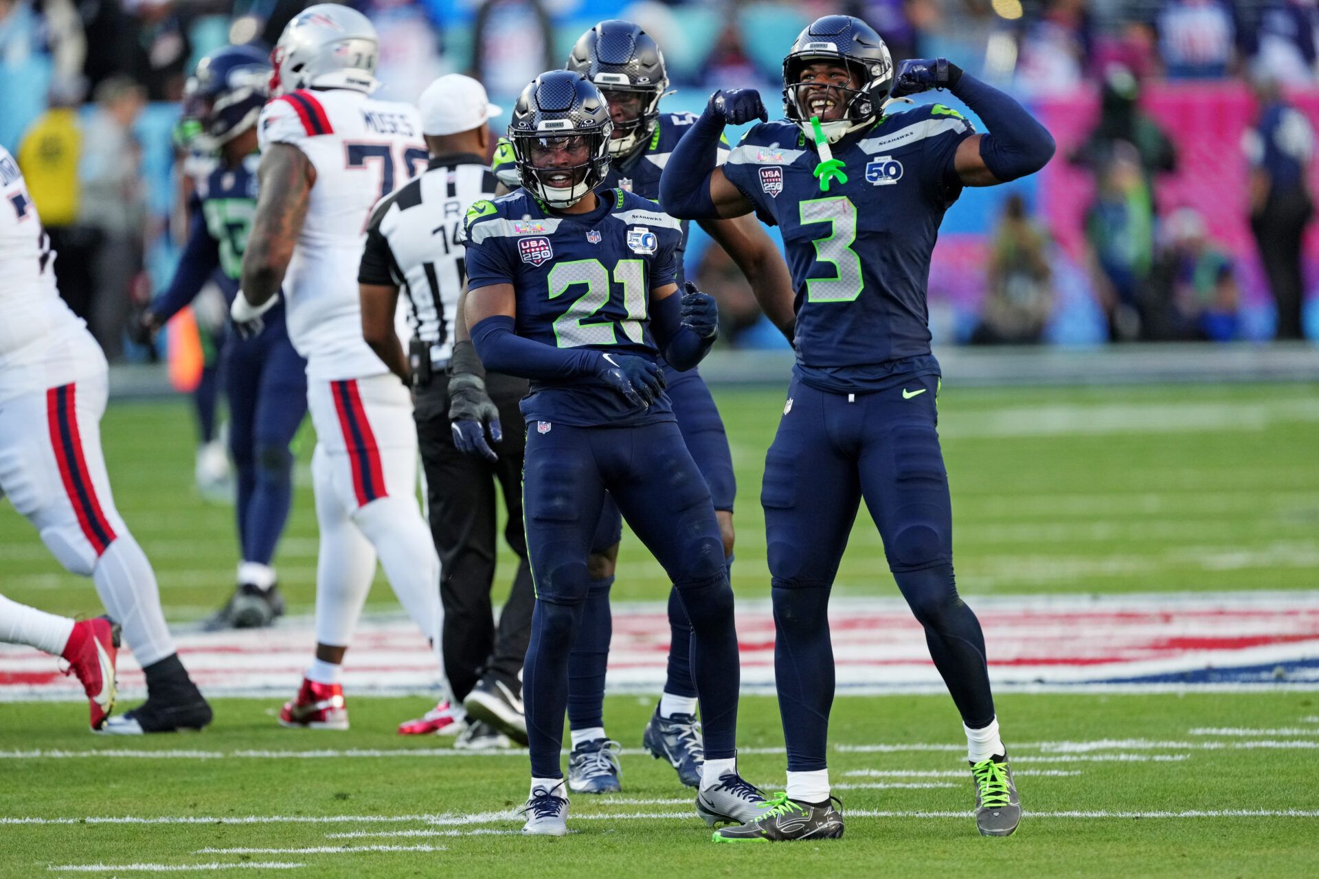 Seattle Seahawks safety Nick Emmanwori (3) and Seattle Seahawks cornerback Devon Witherspoon (21) react after a play during the first quarter against the New England Patriots in Super Bowl LX at Levi's Stadium.