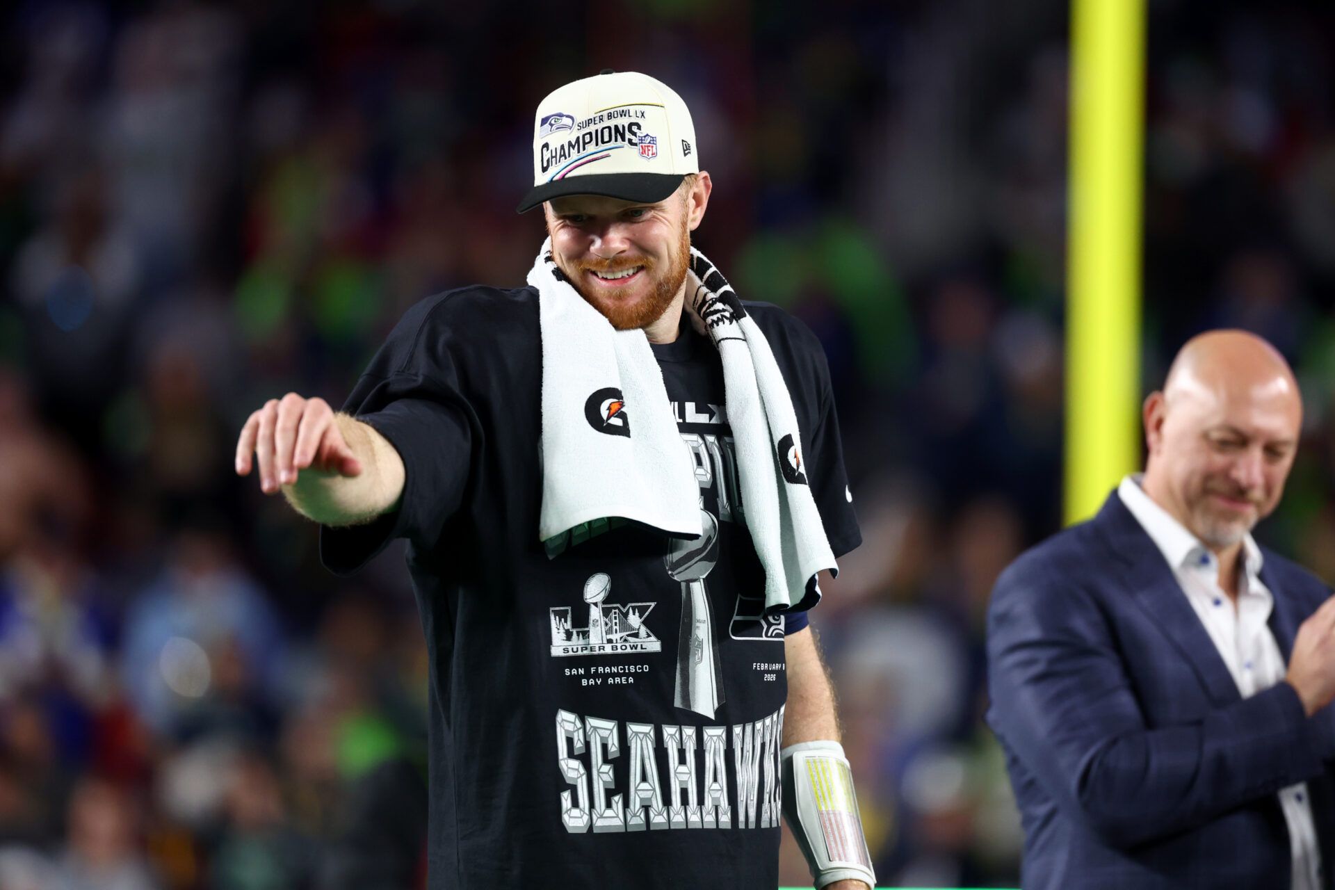 Seattle Seahawks quarterback Sam Darnold (14) celebrates on the podium after defeating the New England Patriots in Super Bowl LX at Levi's Stadium.