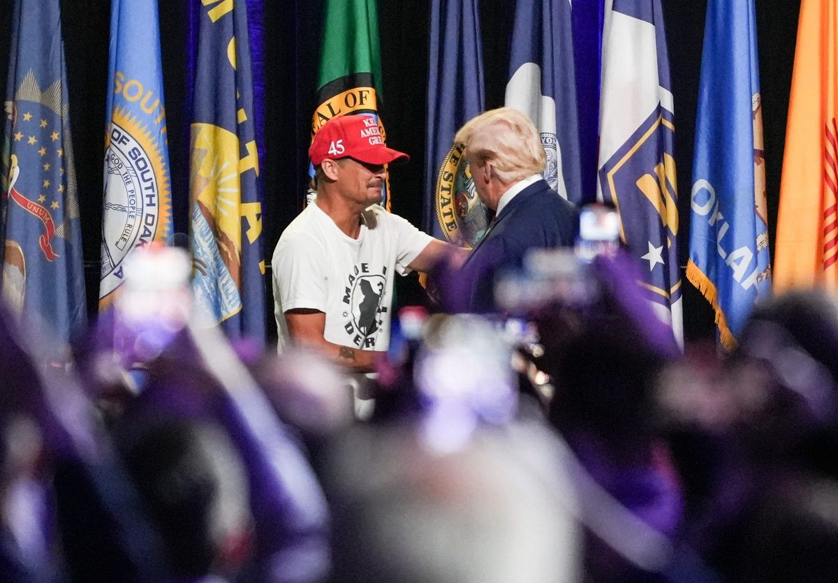 Kid Rock welcomes President Donald Trump during the 146th National Guard Association of the United States general conference & exhibition at Huntington Place in Detroit on Monday, Aug. 26, 2024.