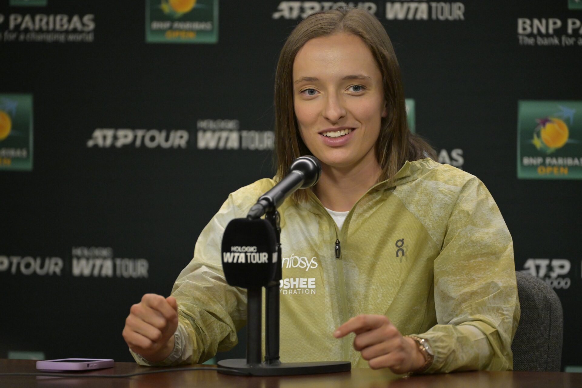 Iga Swiatek (POL) talks to the media during a news conference during the BNP Paribas Open at the Indian Well Tennis Garden.