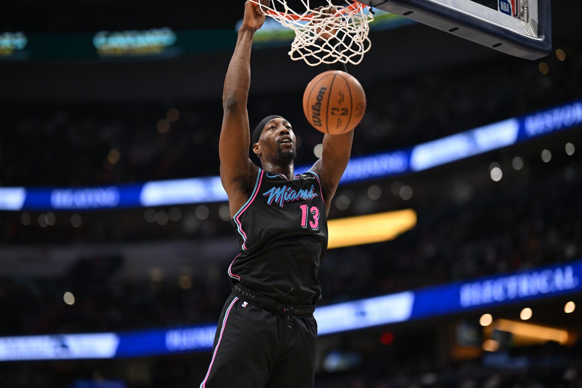 Miami Heat center Bam Adebayo (13) inks the ball against the Washington Wizards during the second quarter at Capital One Arena.