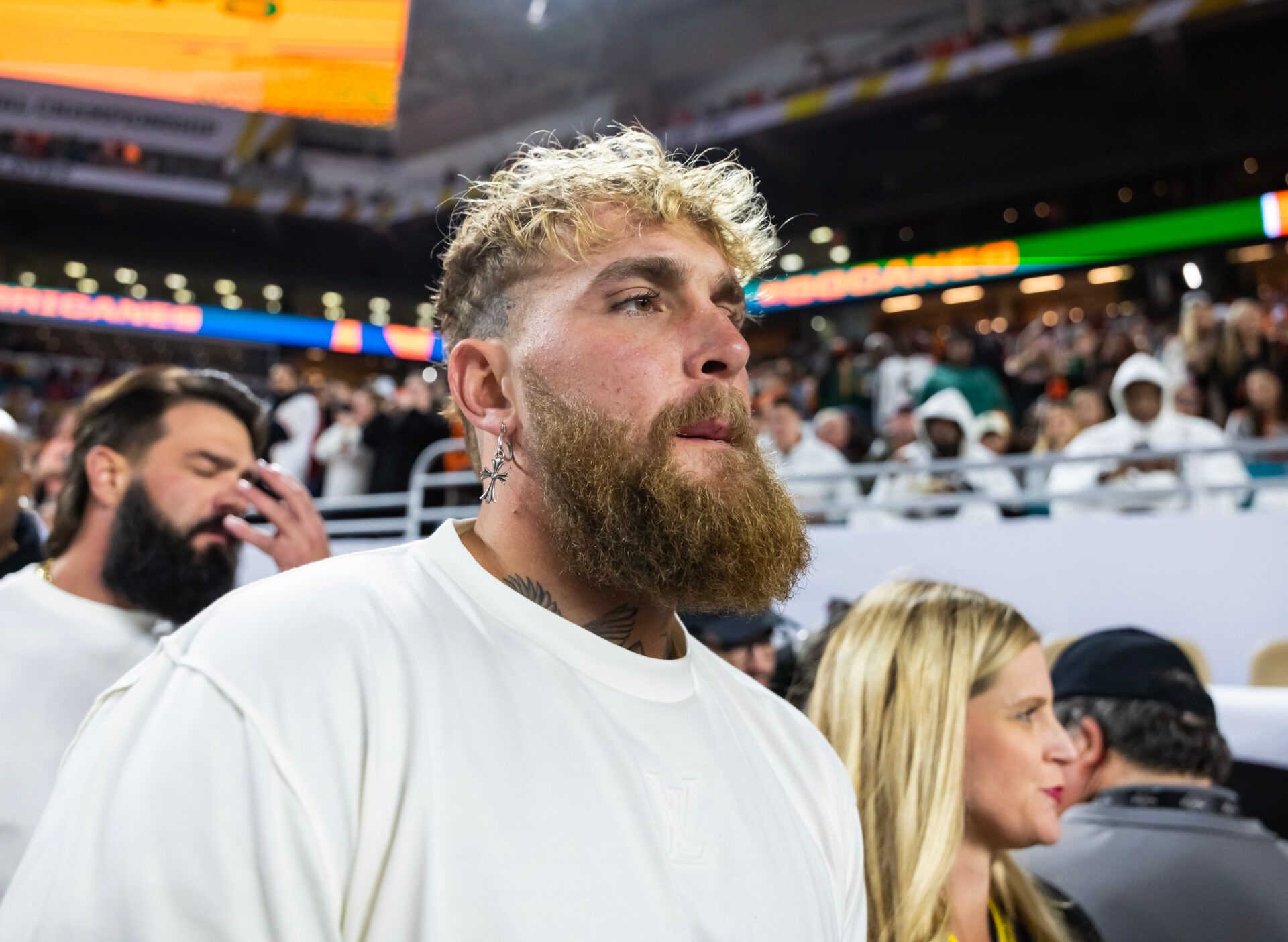 Jake Paul on the sidelines during the College Football Playoff National Championship game at Hard Rock Stadium.