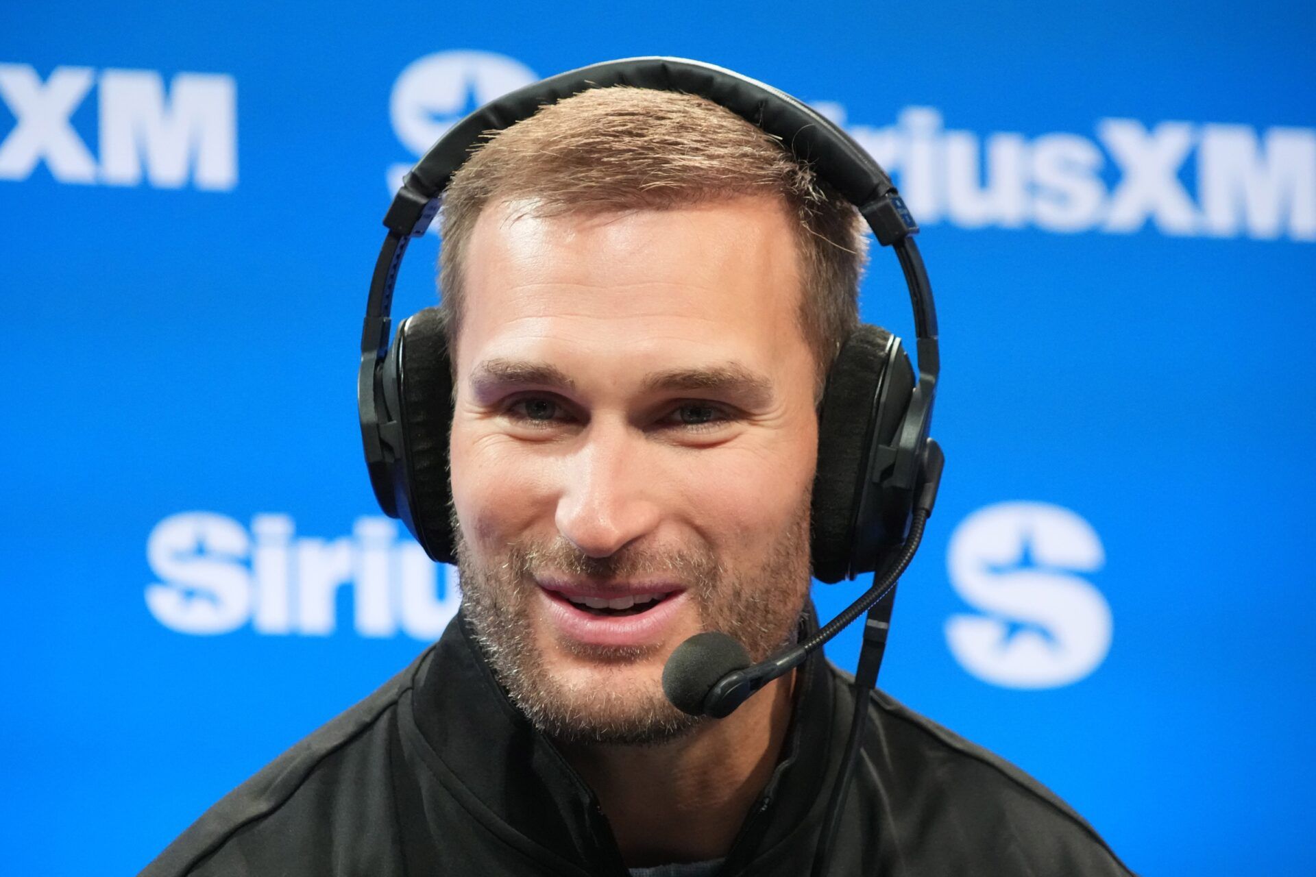 Kirk Cousins on the Opening Drive show at the SiriusXM NFL radio set at the Super Bowl LX media center at the Moscone Center.