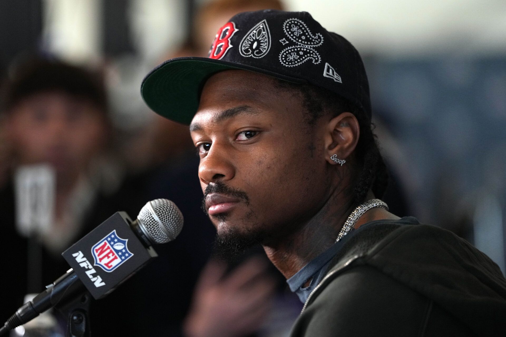 New England Patriots wide receiver Stefon Diggs (8) talks to media members at the Santa Clara Marriott.
