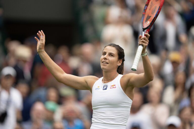 Emma Navarro of the United States celebrates winning her match against Barbora Krejcikova of the Czech Republic on day six at the All England Lawn Tennis and Croquet Club.