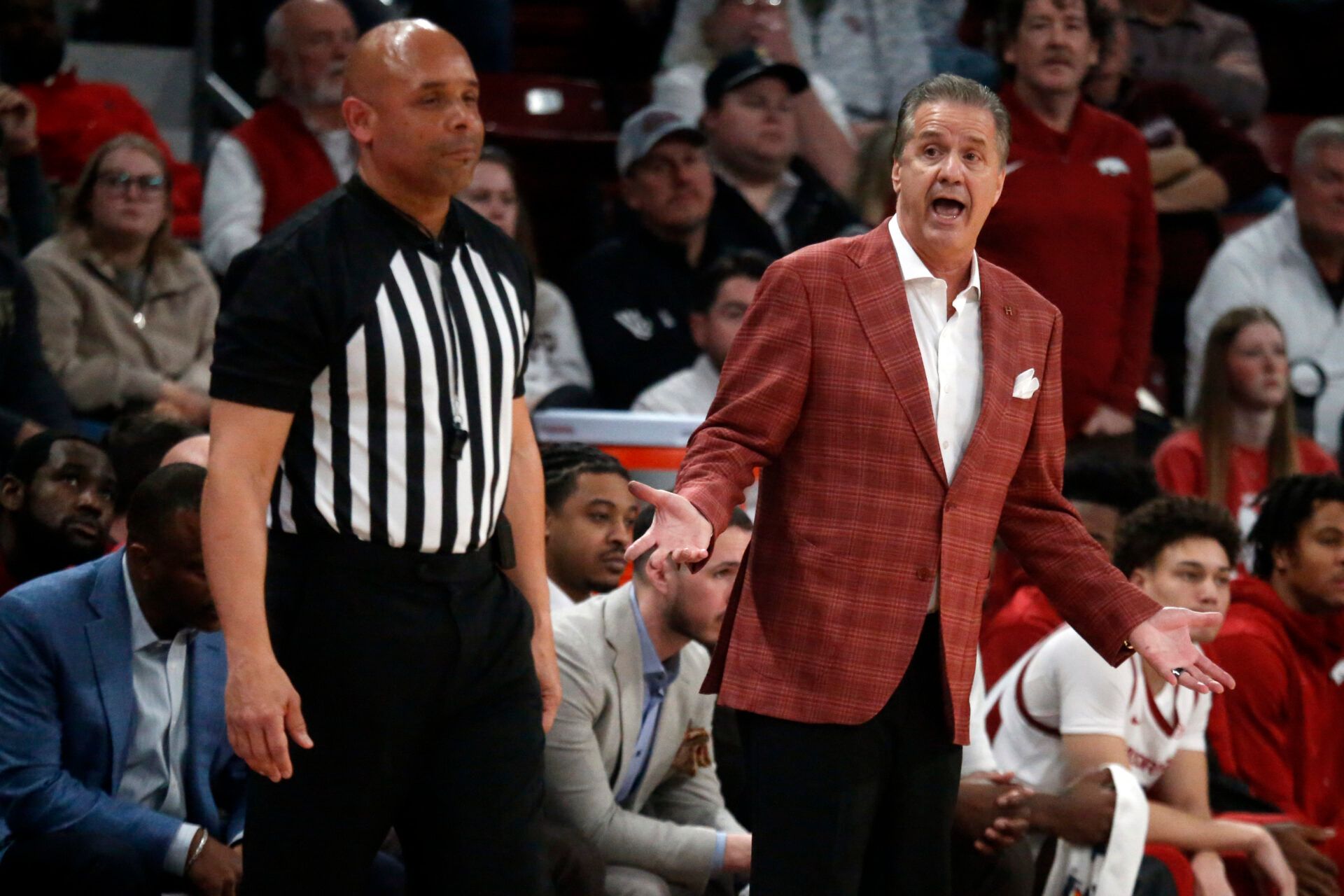 Arkansas Razorbacks head coach John Calipari reacts toward an official during the first half against the Mississippi State Bulldogs at Humphrey Coliseum.