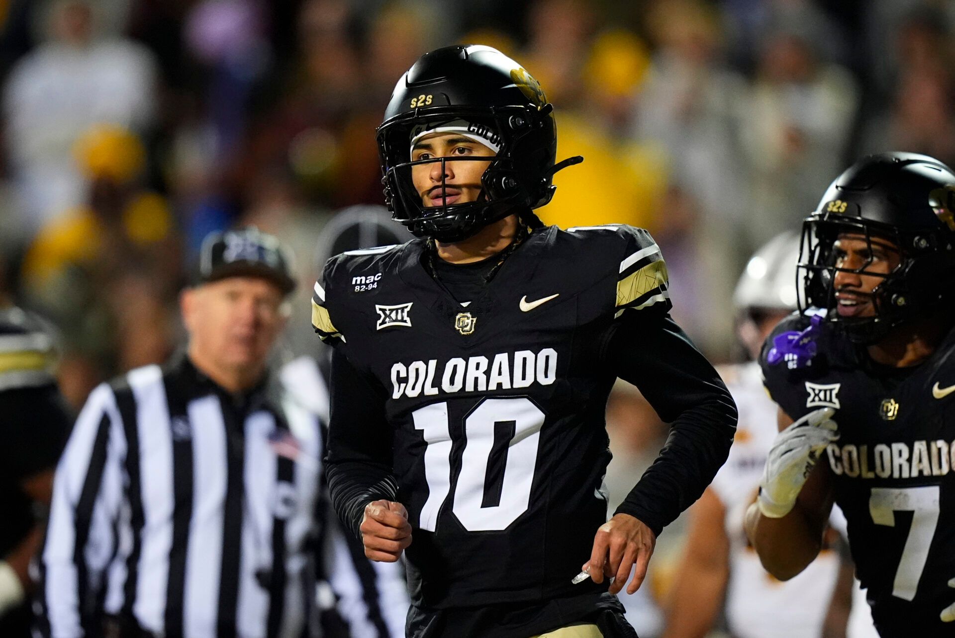 Colorado Buffaloes quarterback Julian Lewis (10) following his third quarter touchdown against the Arizona State Sun Devils at Folsom Field.