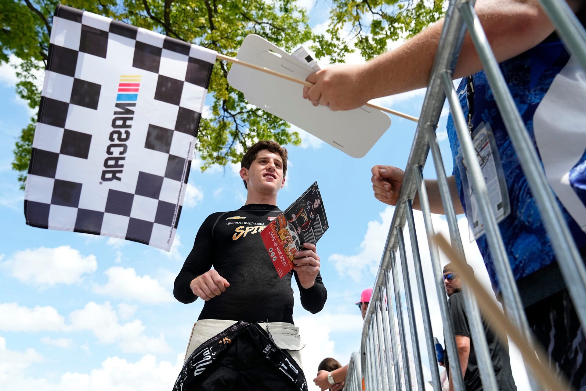 NASCAR Xfinity Series driver Nick Sanchez (48) signs autographs Saturday, July 26, 2025, prior to the Pennzoil 250 at Indianapolis Motor Speedway.