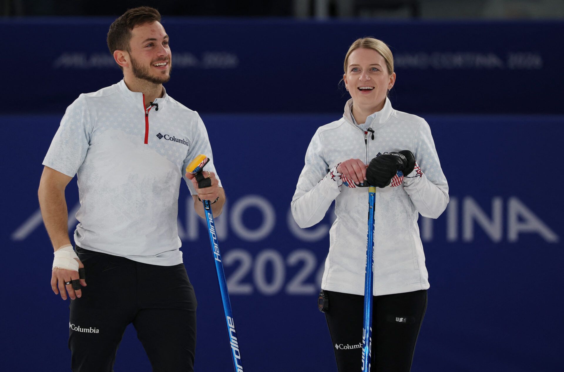 [US, Mexico & Canada customers only] Feb 8, 2026; Cortina d'Ampezzo, ITALY; Korey Dropkin of United States and Cory Thiesse of United States react against Sweden in mixed doubles round robin play during the Milano Cortina 2026 Olympic Winter Games at the Cortina Curling Olympic Stadium.