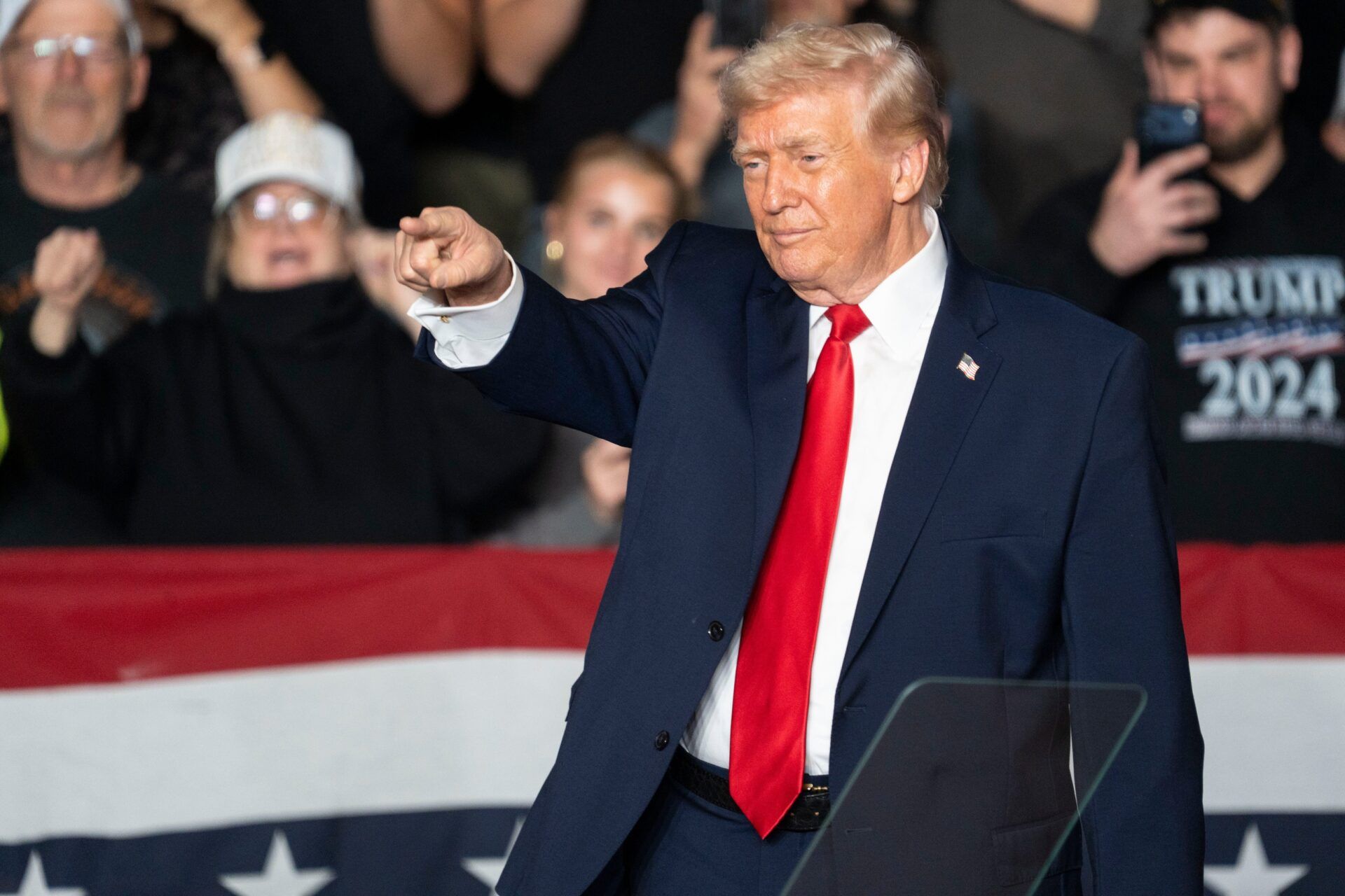 President Donald Trump points into the crowd during a rally at Horizon Events Center on Tuesday, Jan. 27, 2026 in Clive.