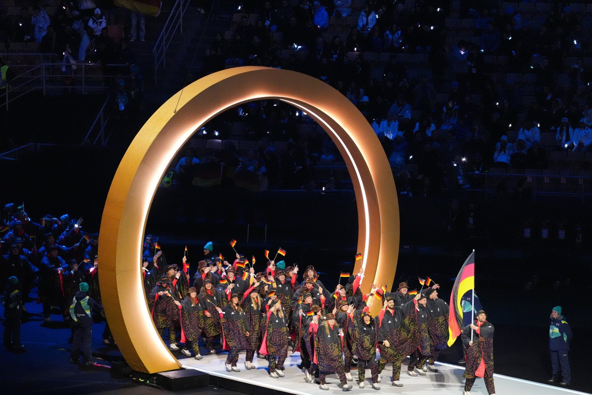 Athletes from Germany are led by flag bearer Leon Draisaitl during the Opening Ceremony for the Milano Cortina 2026 Olympic Winter Games at Milano San Siro Olympic Stadium.