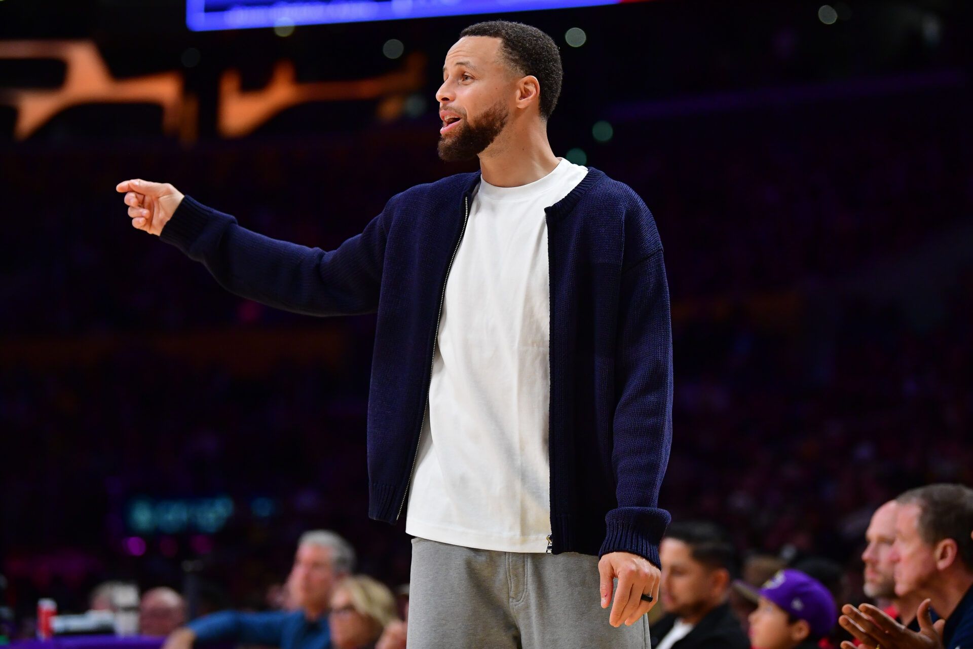 Golden State Warriors guard Stephen Curry (30) watches game action during the second half at Crypto.com Arena.