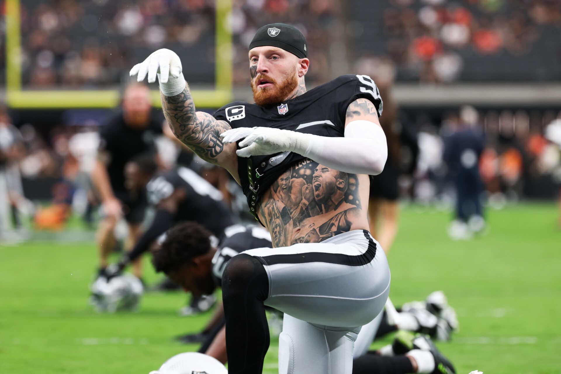 Las Vegas Raiders defensive end Maxx Crosby (98) warms up prior to the game against the Chicago Bears at Allegiant Stadium.
