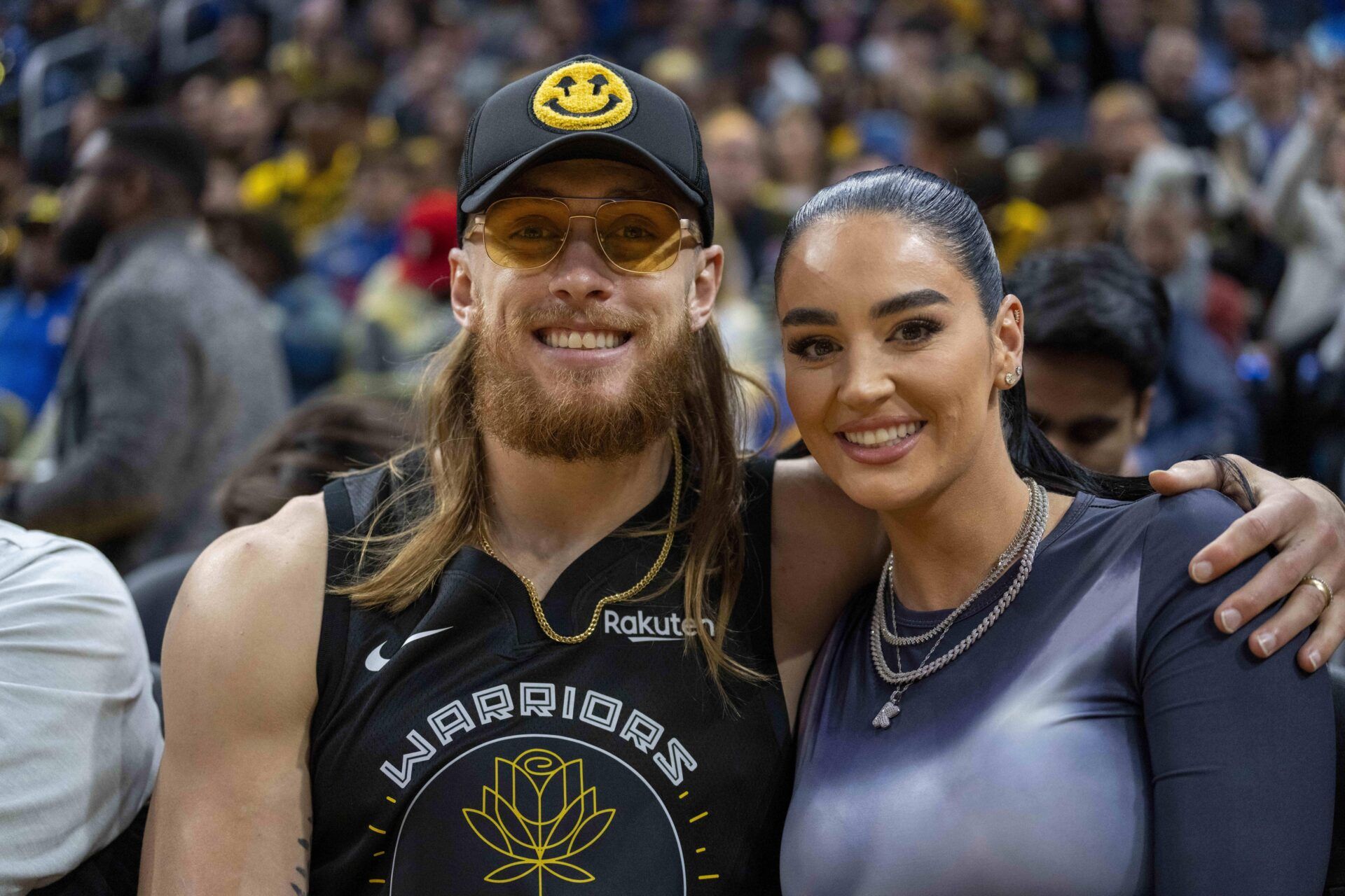 San Francisco 49ers tight end George Kittle and wife Claire Kittle at a game between Golden State Warriors and Philadelphia 76ers during the second quarter at Chase Center.