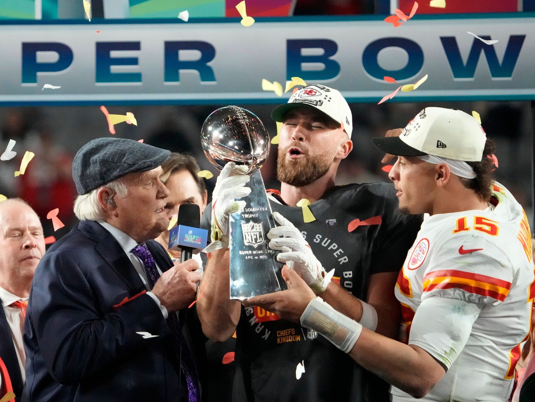 Super Bowl 57: Kansas City Chiefs quarterback Patrick Mahomes passes the the Lombardi Trophy to Travis Kelce after winning the Super Bowl against the Philadelphia Eagles at State Farm Stadium on Feb 12, 2023.