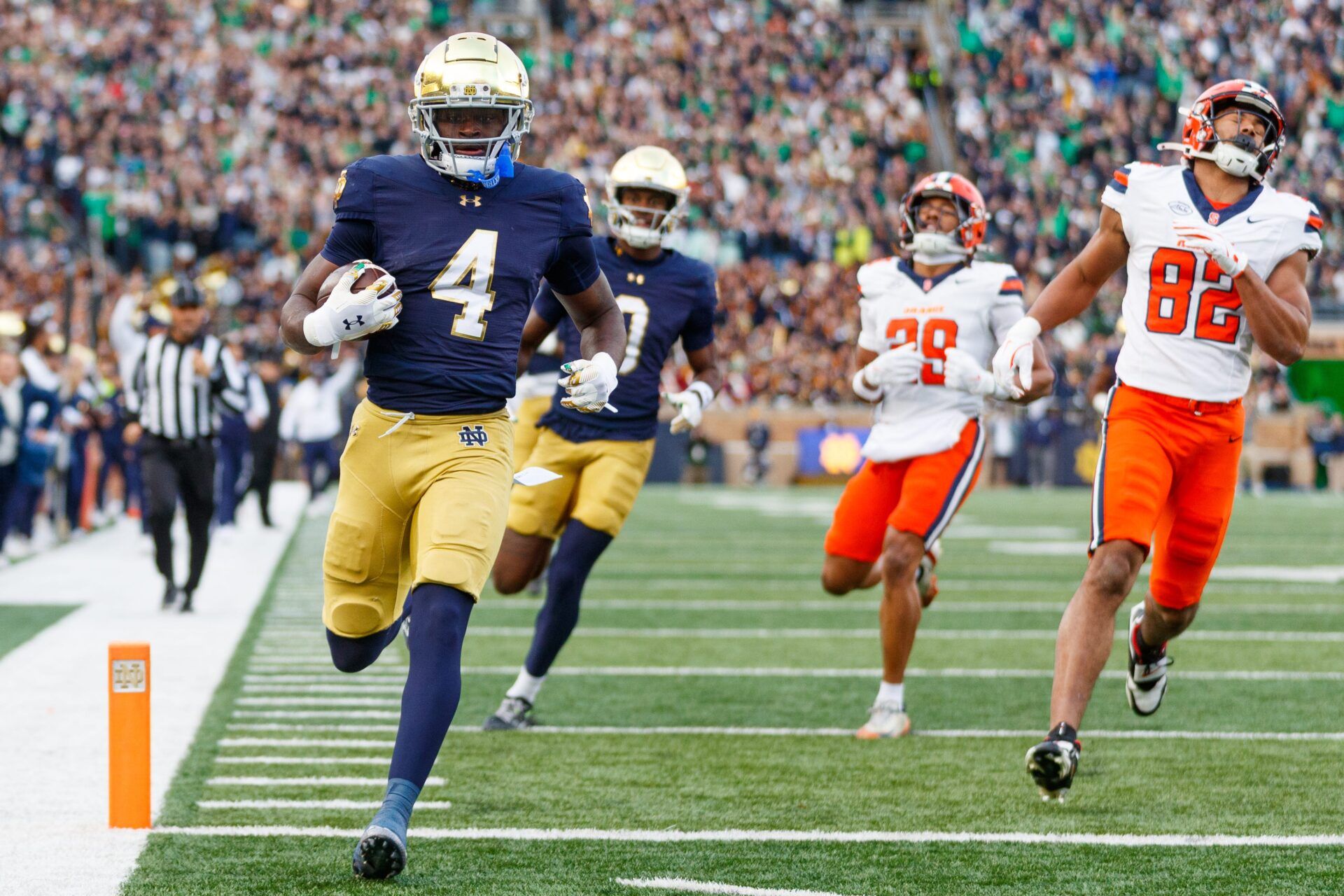 Notre Dame running back Jeremiyah Love (4) runs the ball into the end zone for a touchdown in the first half of a NCAA football game against Syracuse at Notre Dame Stadium on Saturday, Nov. 22, 2025, in South Bend.