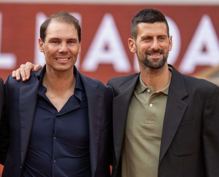 Roger Federer of Switzerland, Novak Djokovic of Serbia and Andy Murray of Great Britain with Rafael Nadal of Spain during the presentation ceremony paying tribute to the career of Rafael Nadal of Spain  on a packed Court Philippe Chatrier Courtday on day one at Roland Garros Stadium.