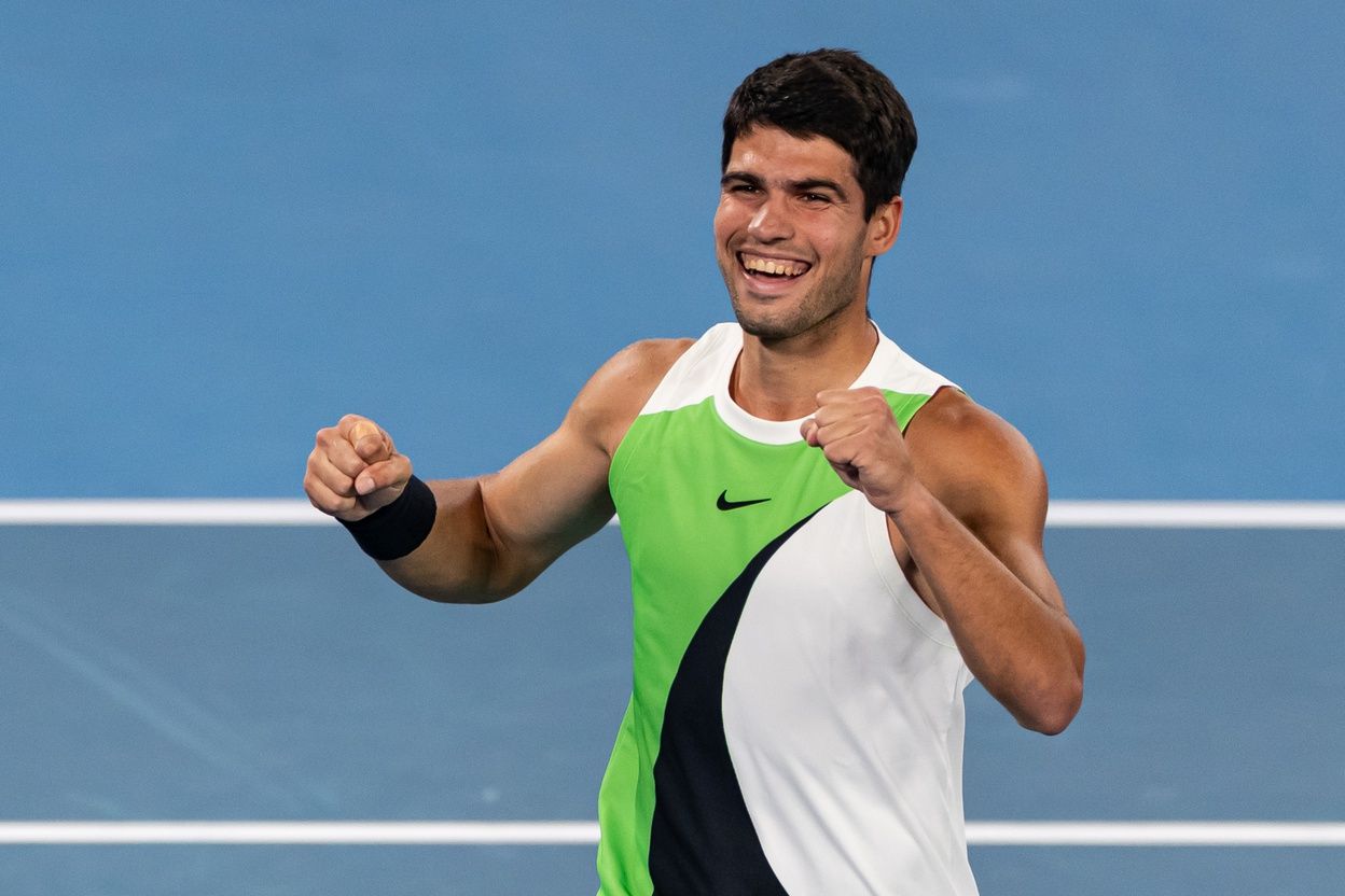 Carlos Alcaraz of Spain celebrates his victory over Novak Djokovic of Serbia in the final of the mens singles at the Australian Open at Rod Laver Arena in Melbourne Park.