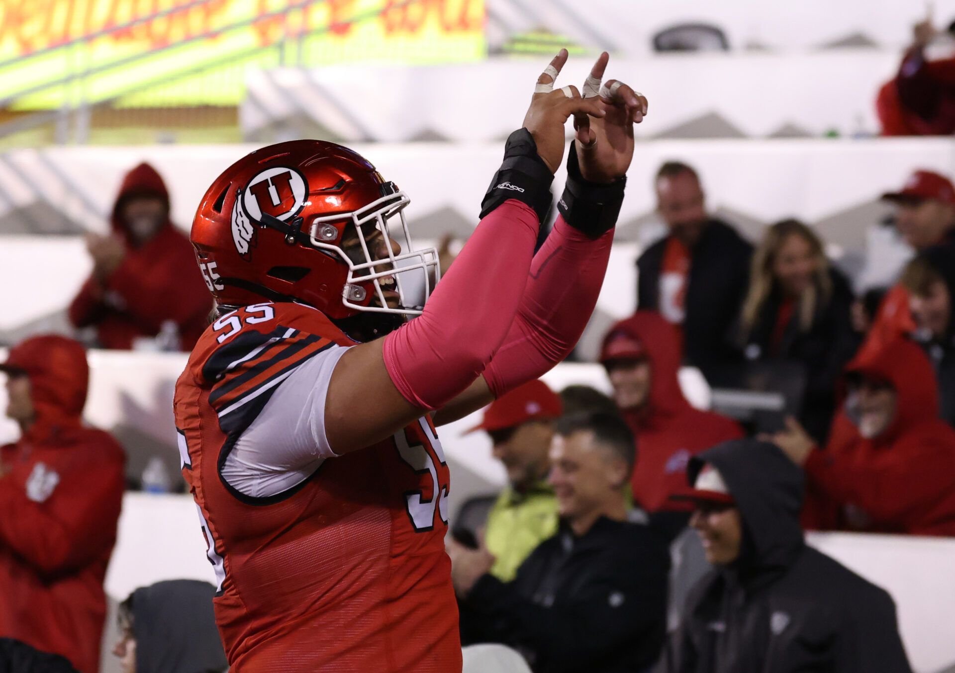Utah Utes offensive lineman Spencer Fano (55) celebrates a touchdown against the Arizona State Sun Devils during the third quarter at Rice-Eccles Stadium.