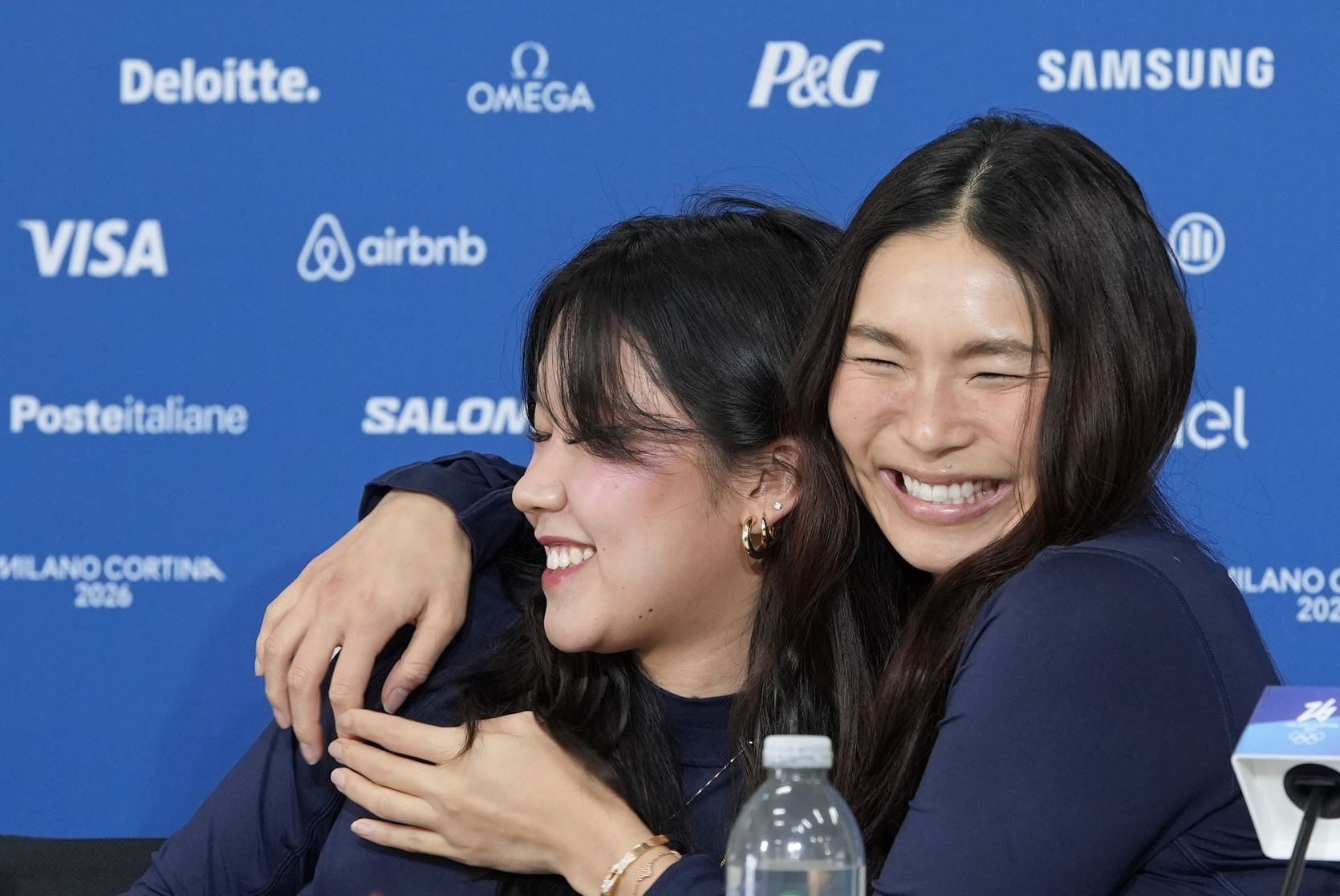 United States snowboarders Bea Kim and Chloe Kim huge during a press conference during the Milano Cortina 2026 Olympic Winter Games at Livigno Snow Park.