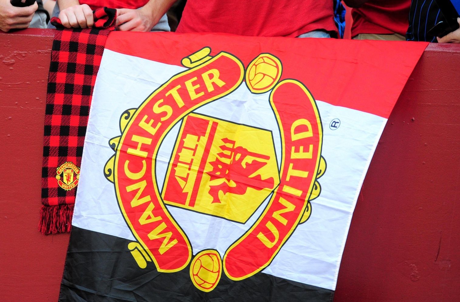 Fans hang a flag prior to the match between Inter Milan and Manchester United at FedEx Field.