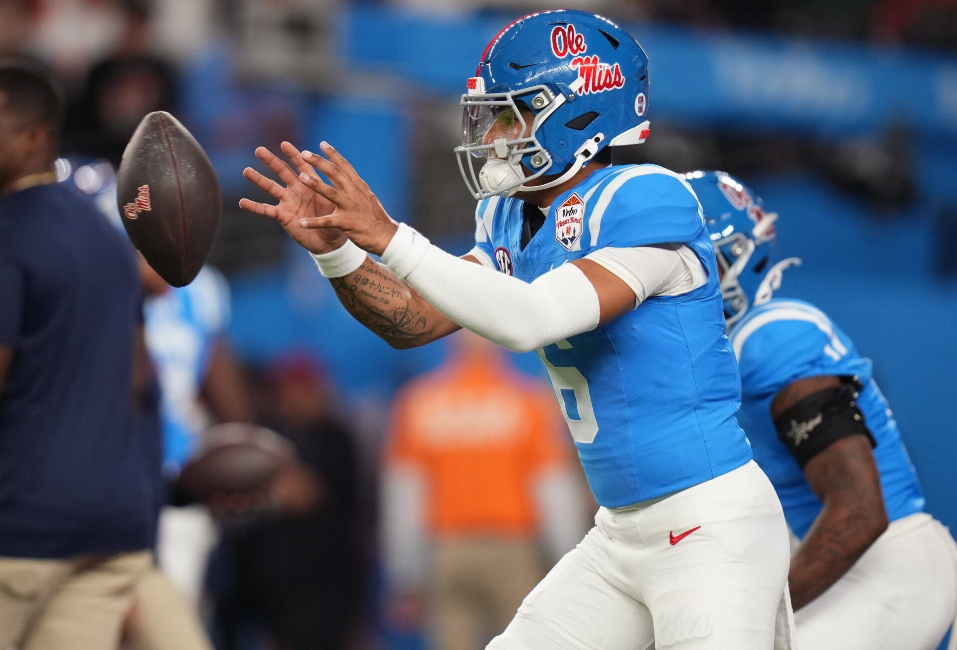 Ole Miss Rebels quarterback Trinidad Chambliss (6) warms up before their Vrbo Fiesta Bowl matchup against the Miami Hurricanes at State Farm Stadium in Glendale, on Jan. 8, 2026.