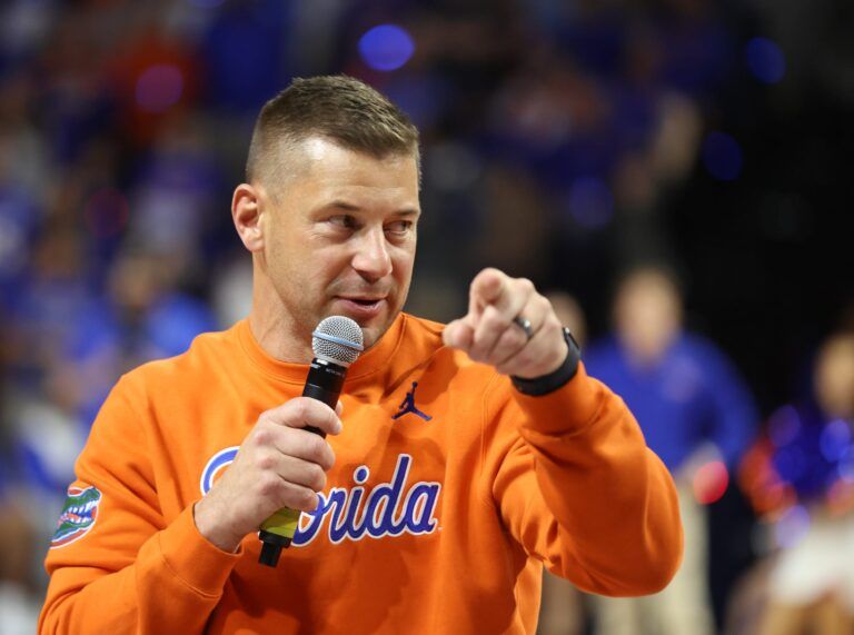 New Gator head football coach Jon Sumrall fires up the crowd during the first half an NCAA basketball game at Steven C. O'Connell Center Exactek arena in Gainesville, FL on Saturday, January 24, 2026. Auburn won 76-67 [Alan Youngblood/Gainesville Sun]