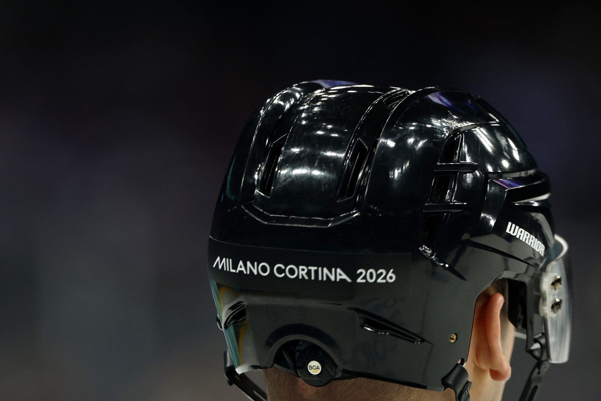 The back of the helmet of the match officials during the match in men's ice hockey group B play between Finland and Slovakia during the Milano Cortina 2026 Olympic Winter Games at Milano Santagiulia Ice Hockey Arena.