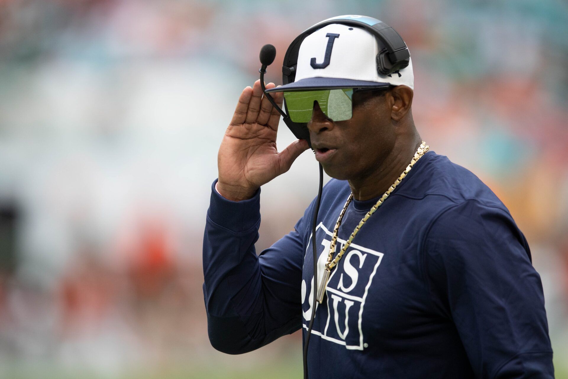Jackson State University head coach Deion Sanders walks along the sideline during the Orange Blossom Classic between Florida A&M University and Jackson State University at Hard Rock Stadium in Miami Gardens, Fla., on Sunday, Sept. 5, 2021.