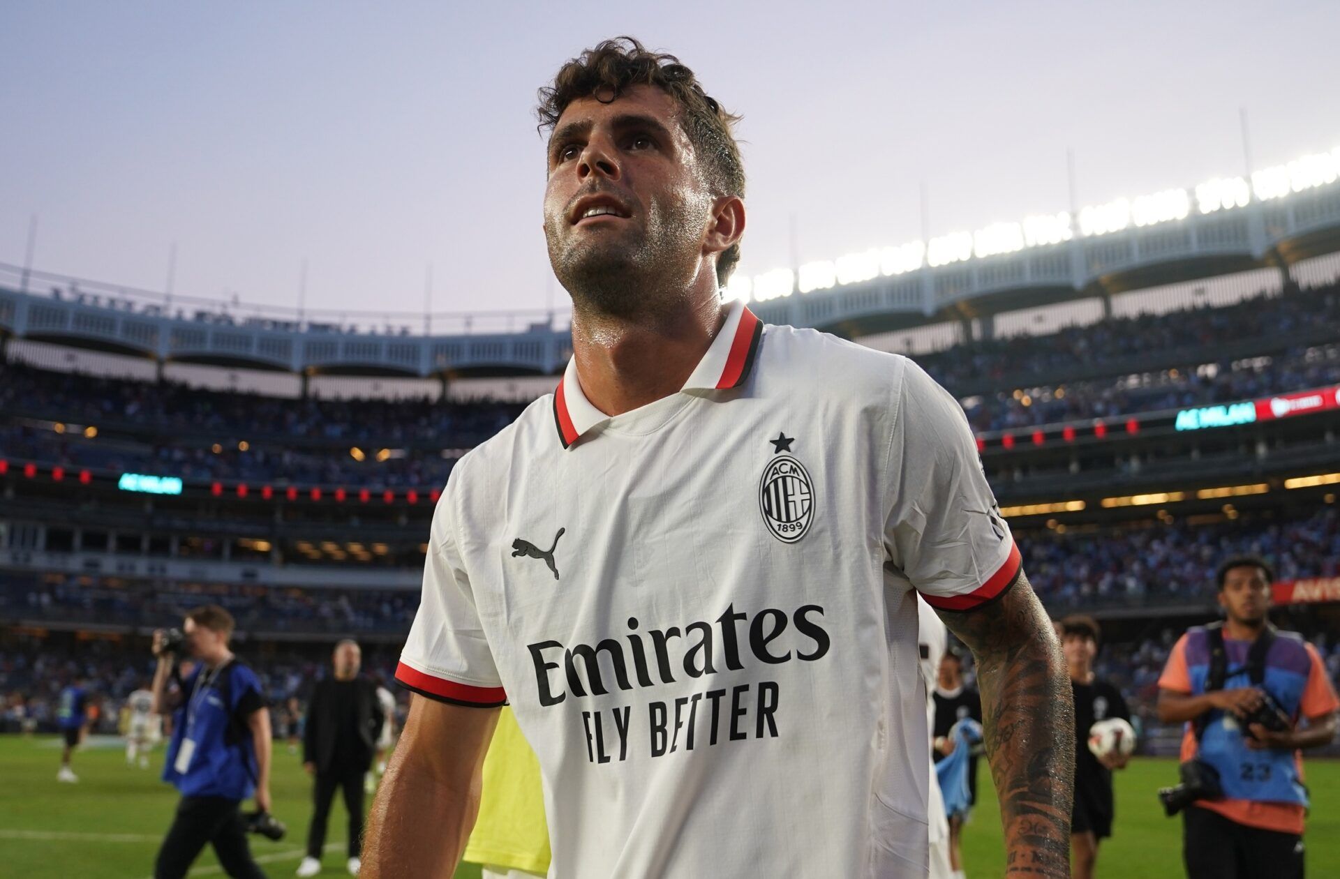 AC Milan midfielder Christian Pulisic (11) shakes hands with players after the game against Manchester City at Yankee Stadium.