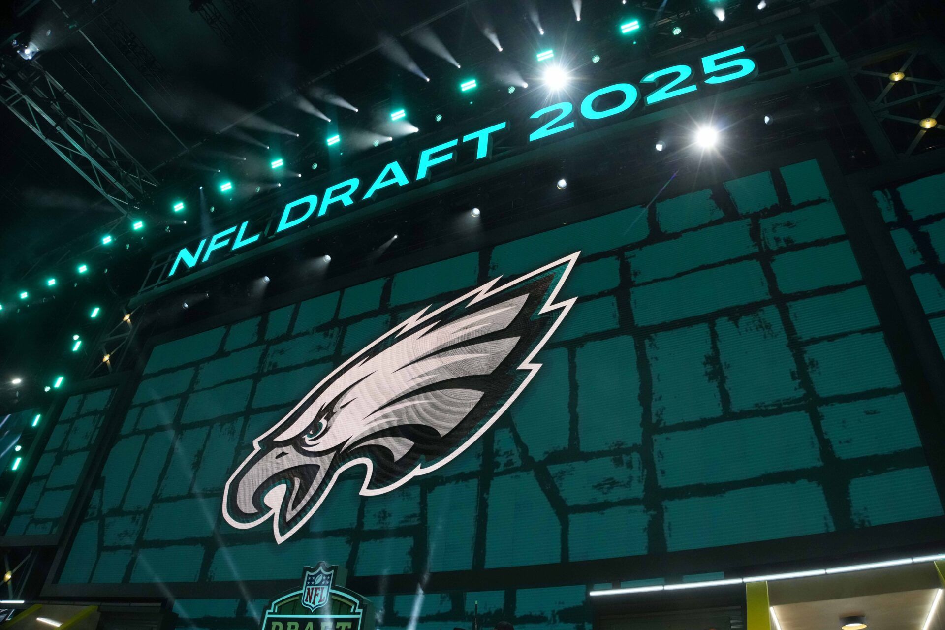 The Philadelphia Eagles logo is projected on the video board during the NFL Draft at Lambeau Field.