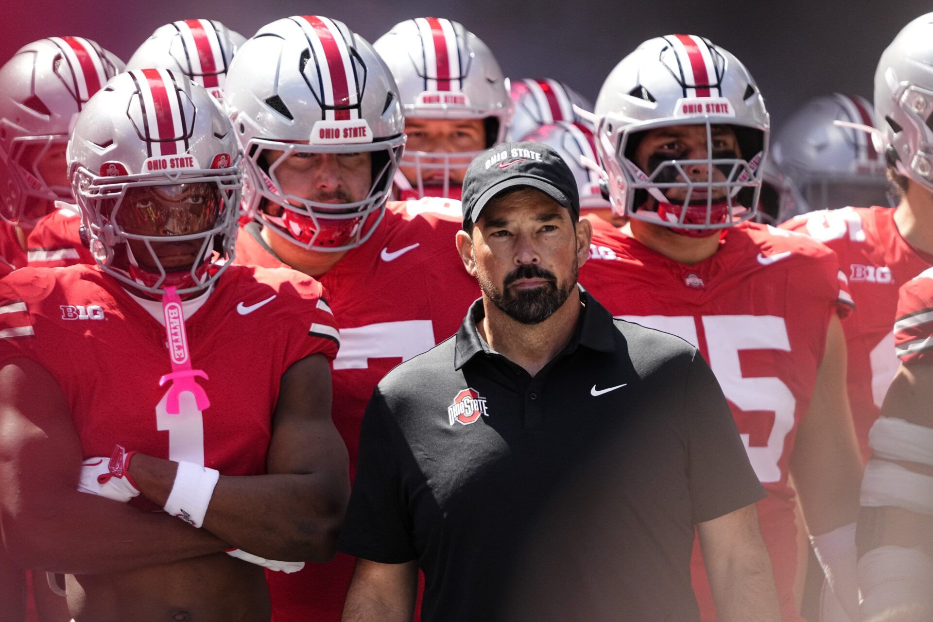 Ohio State Buckeyes head coach Ryan Day leads his team onto the field prior to the NCAA football game against the Texas Longhorns at Ohio Stadium on Aug. 30, 2025.