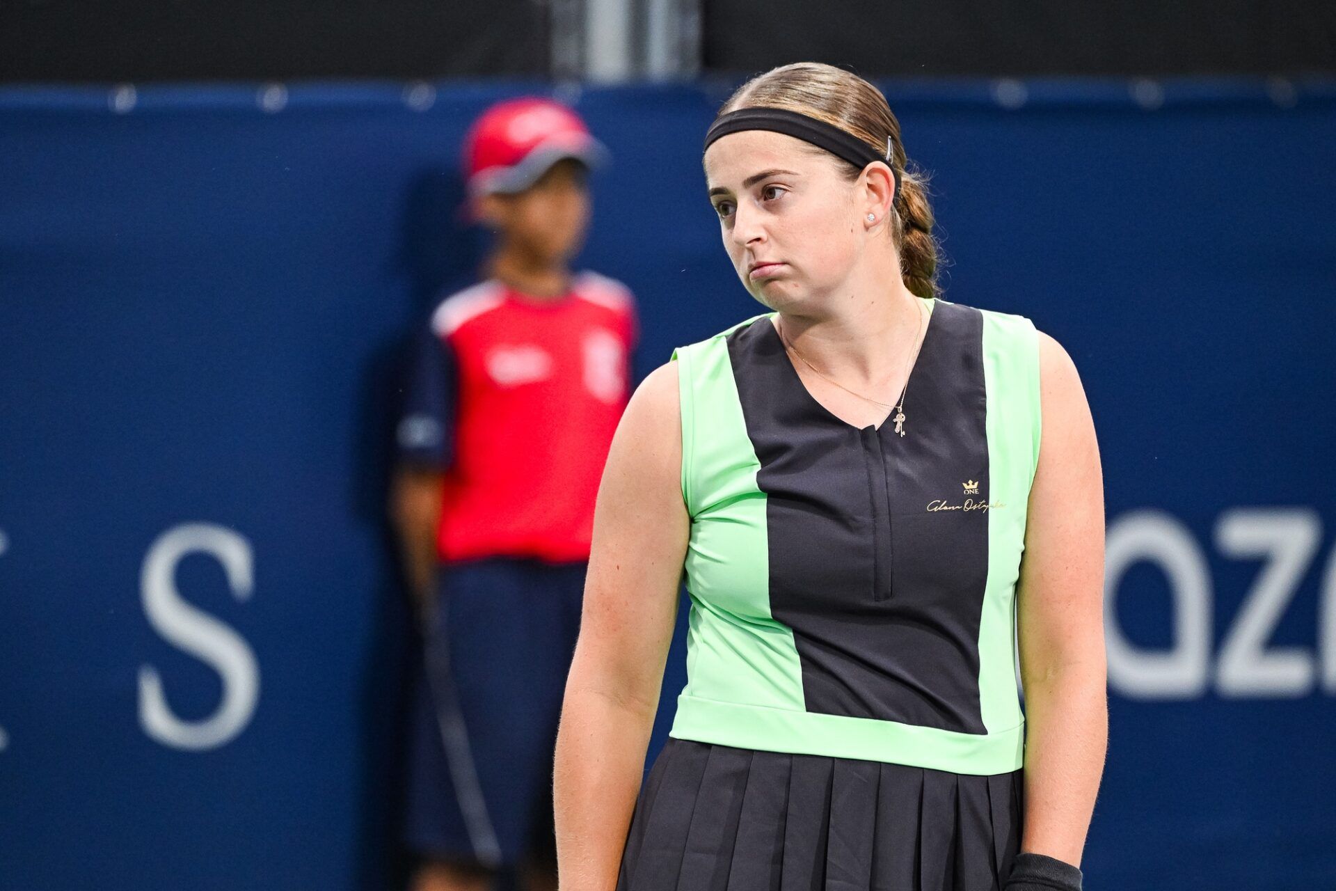Jelena Ostapenko (LAT) reacts after losing a point against Jennifer Brady (USA)  (not pictured) during first round play at IGA Stadium.