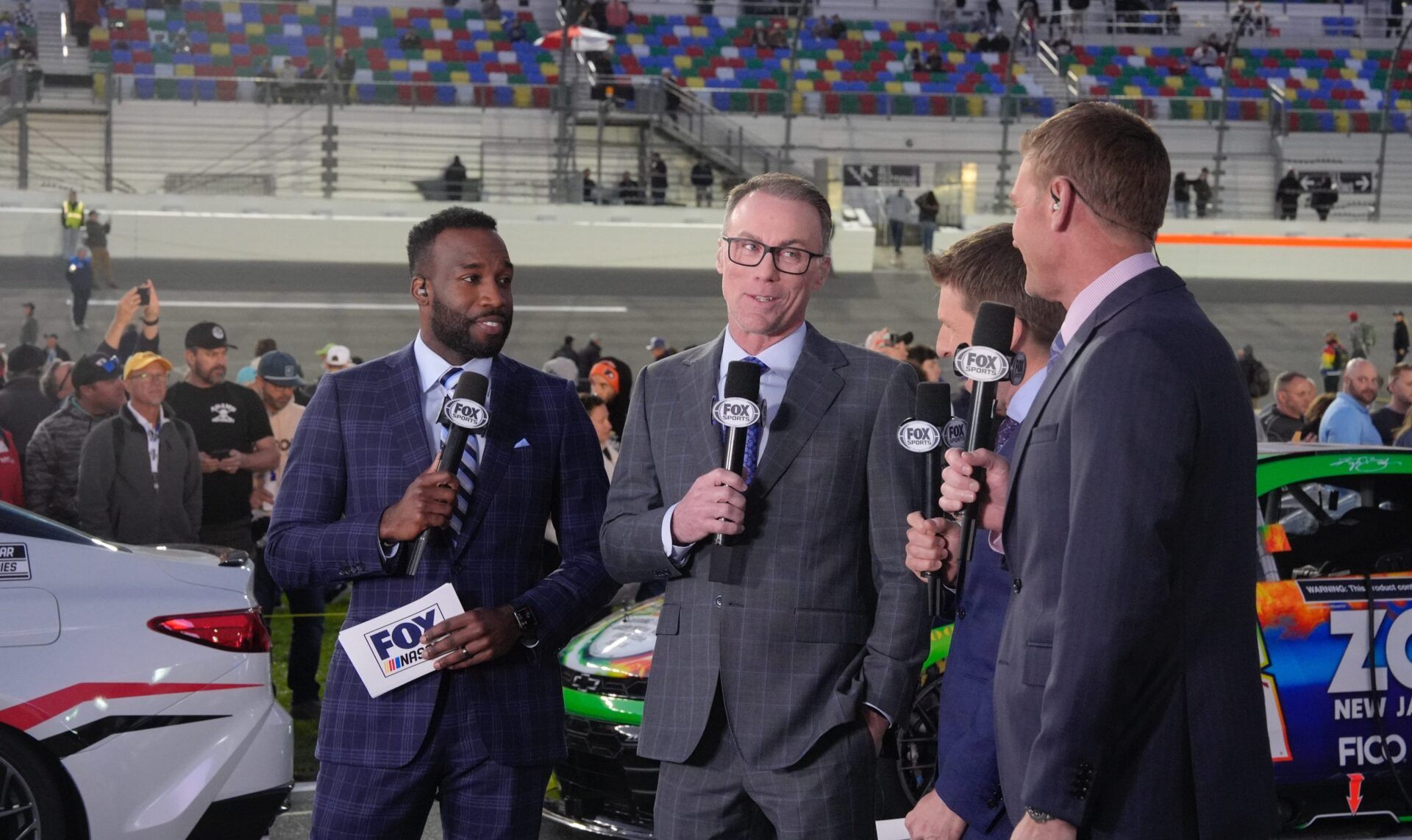 Fox NASCAR broadcasters Josh Sims, Kevin Harvick, Jamie McMurray and Clint Bowyer chat before the Duels, Thursday, Feb. 12, 2026 at Daytona International Speedway.