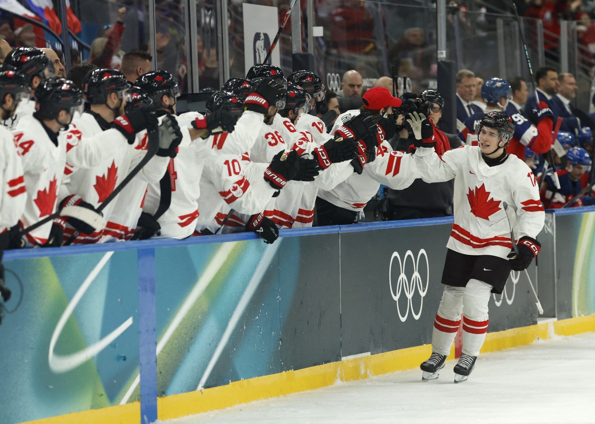 Macklin Celebrini of Canada celebrates scoring their first goal against Czechia  in a men's ice hockey group A match during the Milano Cortina 2026 Olympic Winter Games at Milano Santagiulia Ice Hockey Arena.